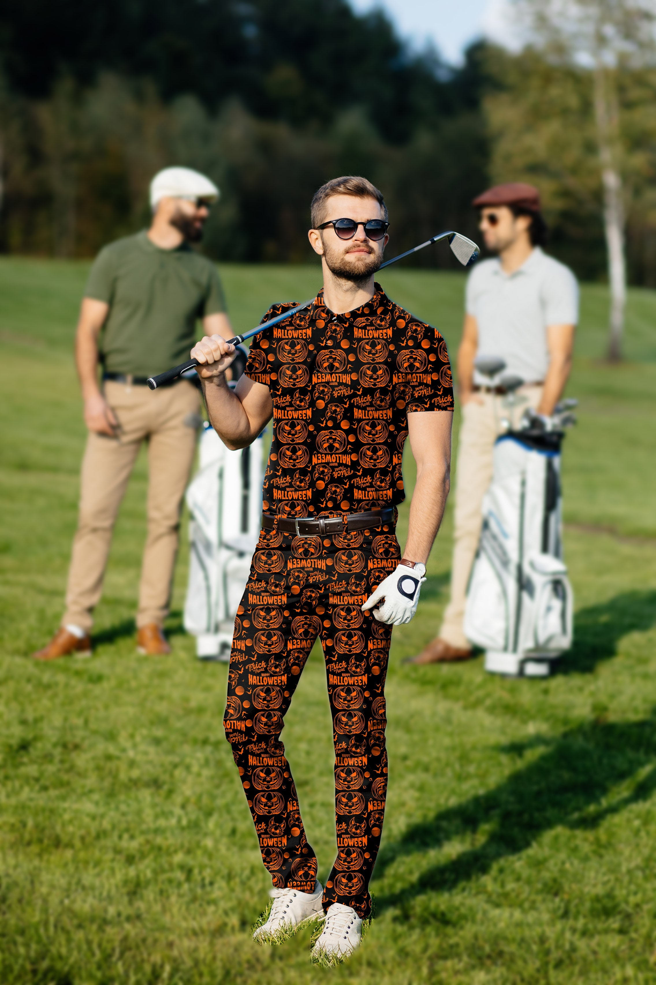Men's Golf Set Halloween-themed pumpkin polo and pants on golfer on course