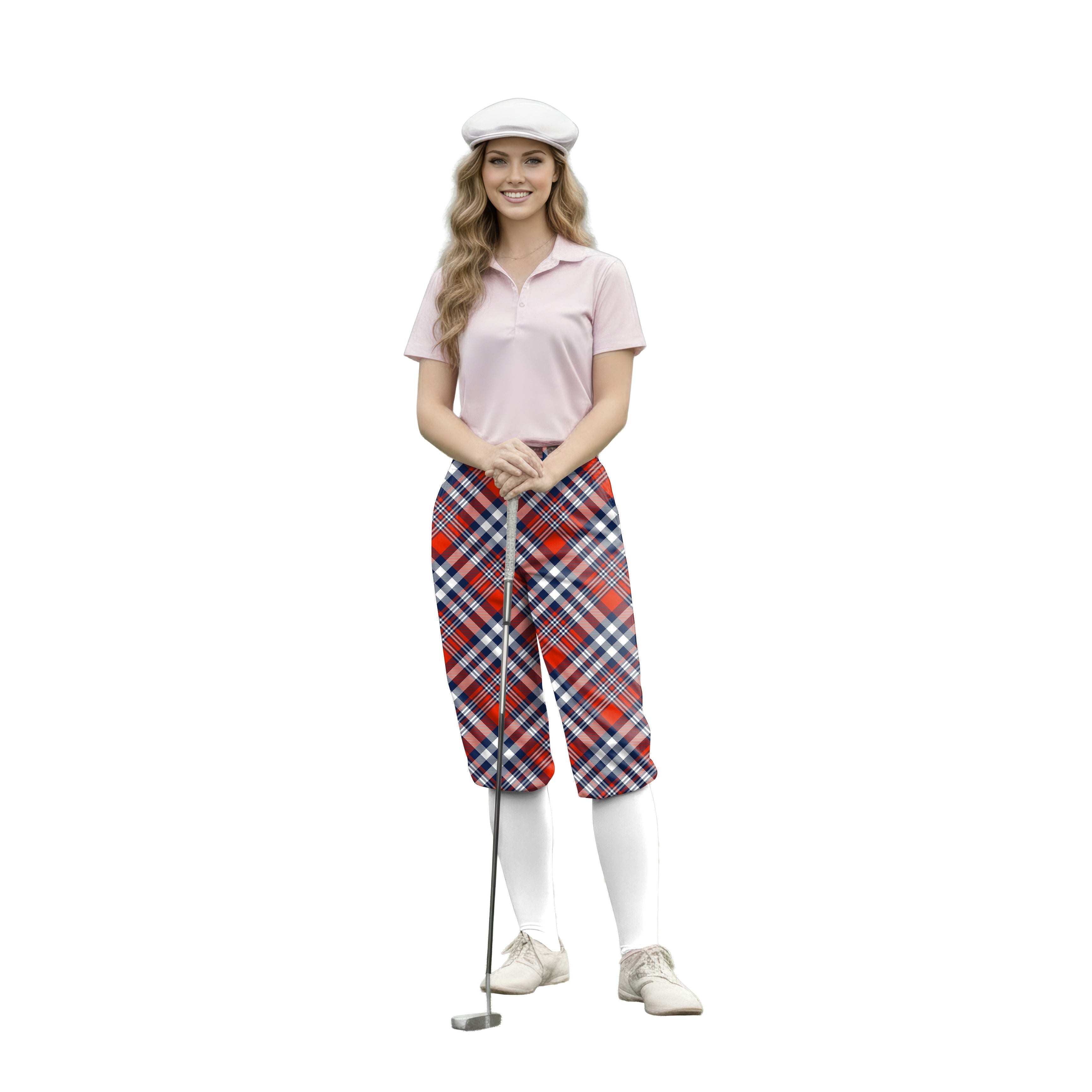 woman wearing red grey diagonal grid womens golf knickers pants with pink polo shirt and white shoes holding golf club