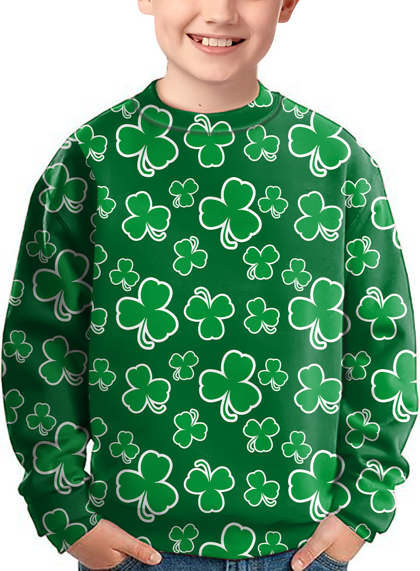 Child wearing green crewneck pullover with white leaf clover pattern for St. Patrick's Day