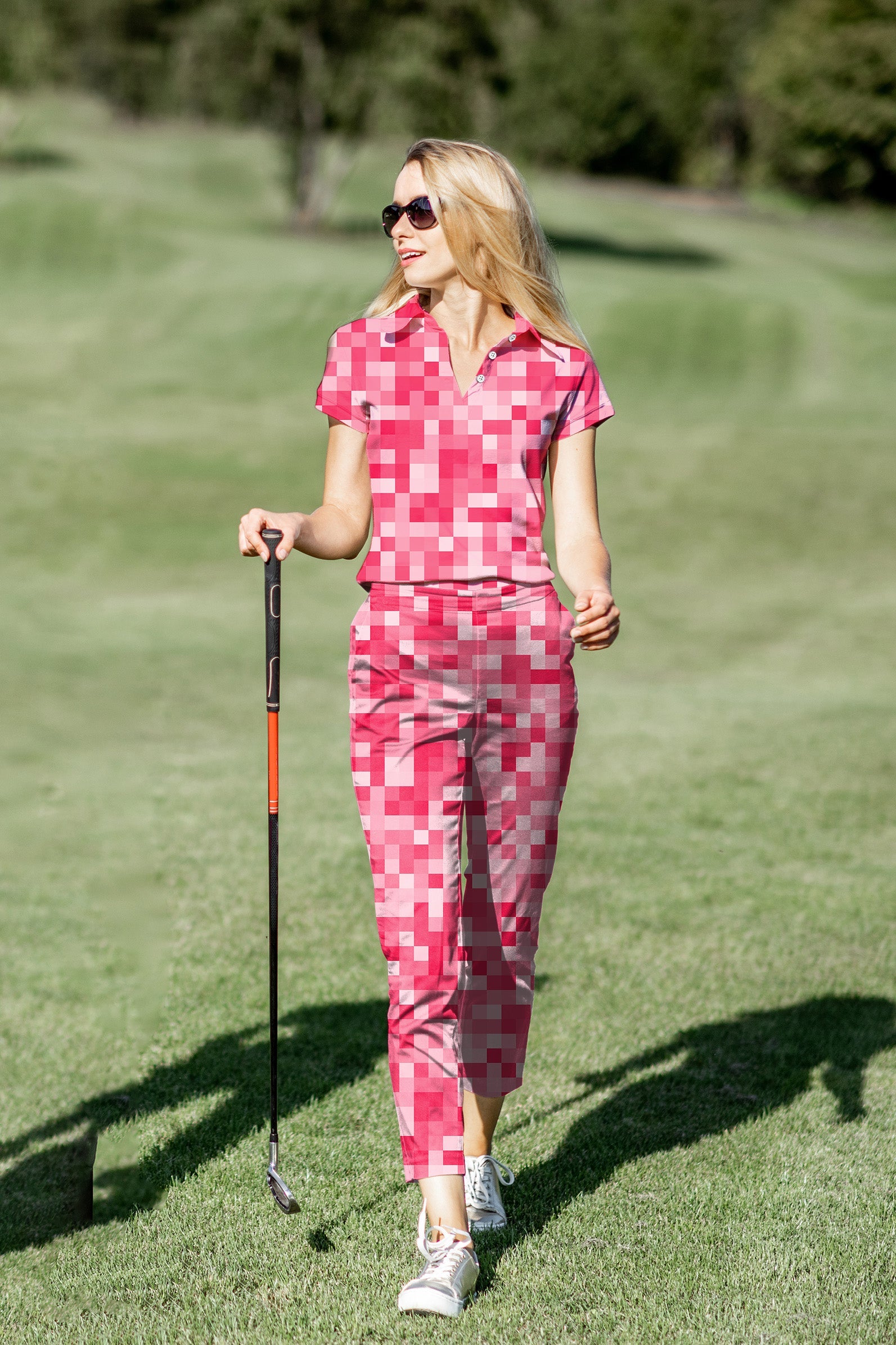Women’s golf polo and pants set in light red pixel pattern with four-way stretch and UPF 40+ protection