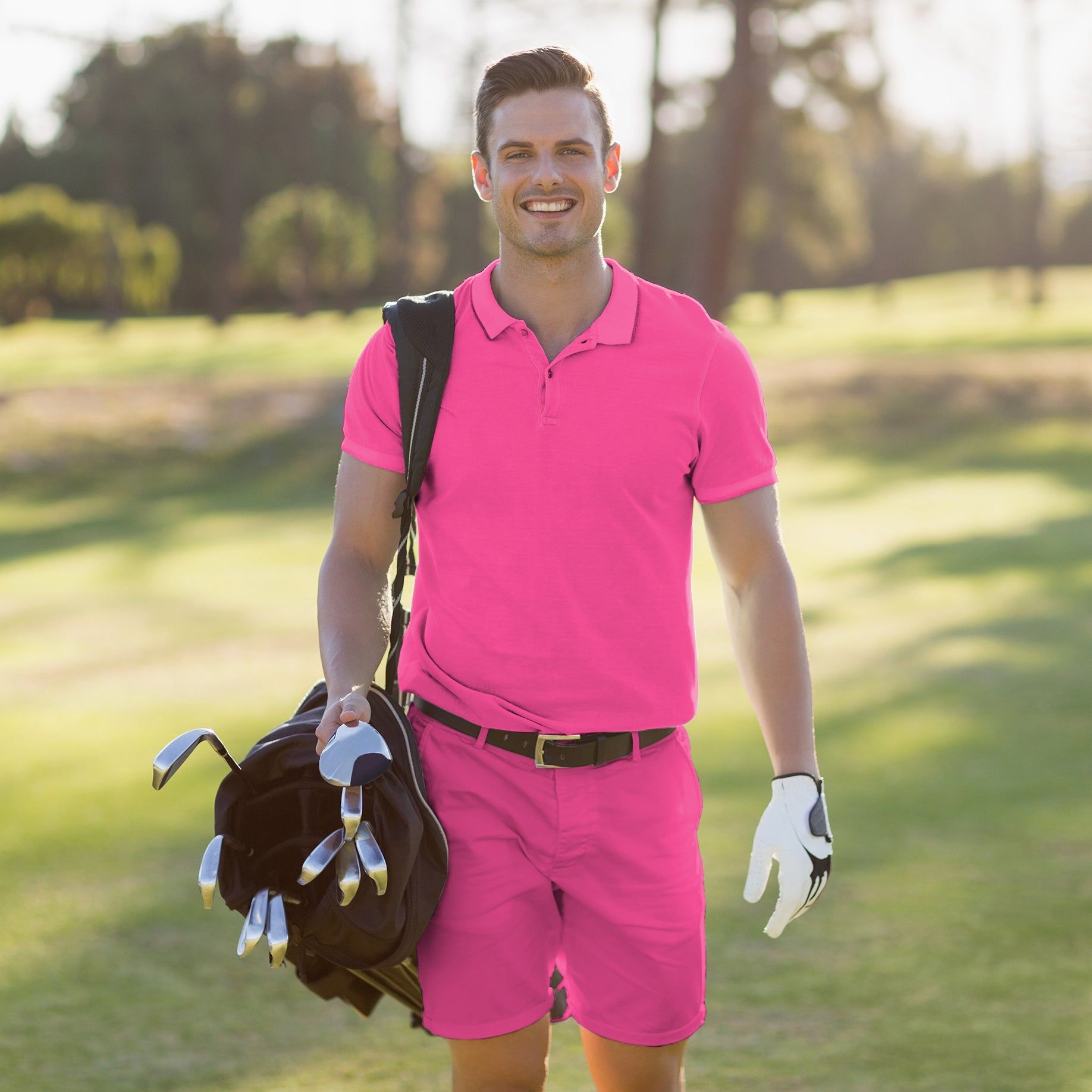 Men's golf set with pure fuchsia polo and shorts, moisture-wicking, wrinkle-resistant, and UPF 40+ protection
