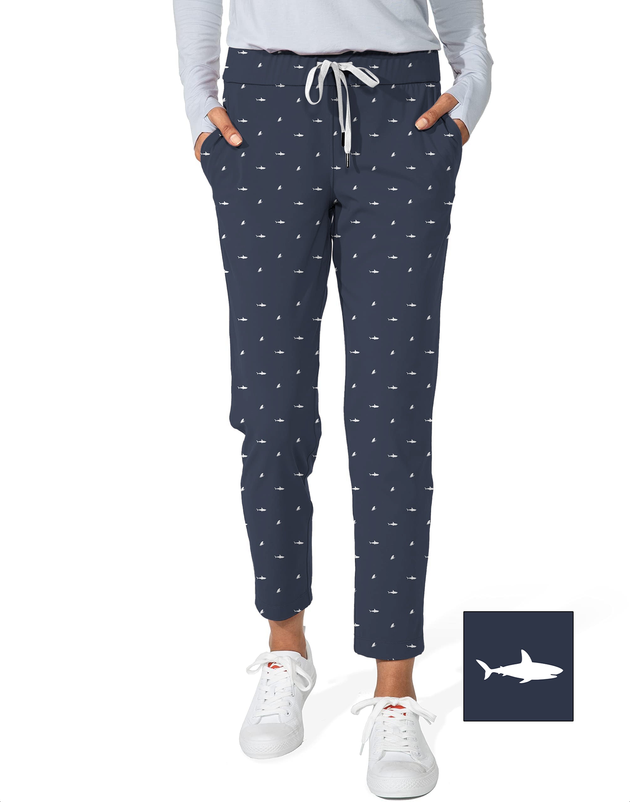 Women's navy stretch ankle golf pants with white shark pattern and drawstring waistband