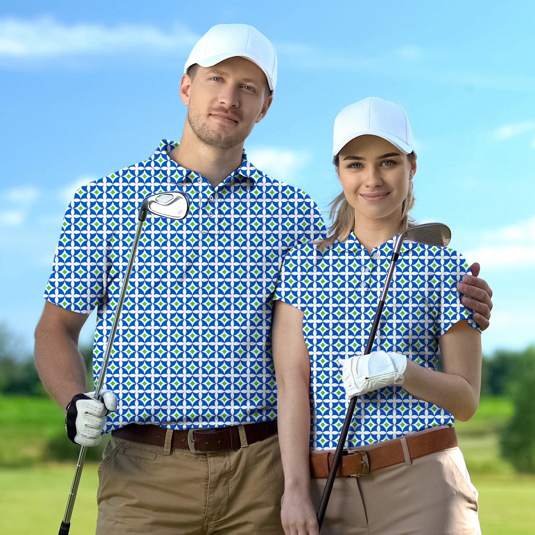 Couple wearing blue-green diamond set golf shirts with white caps on golf course