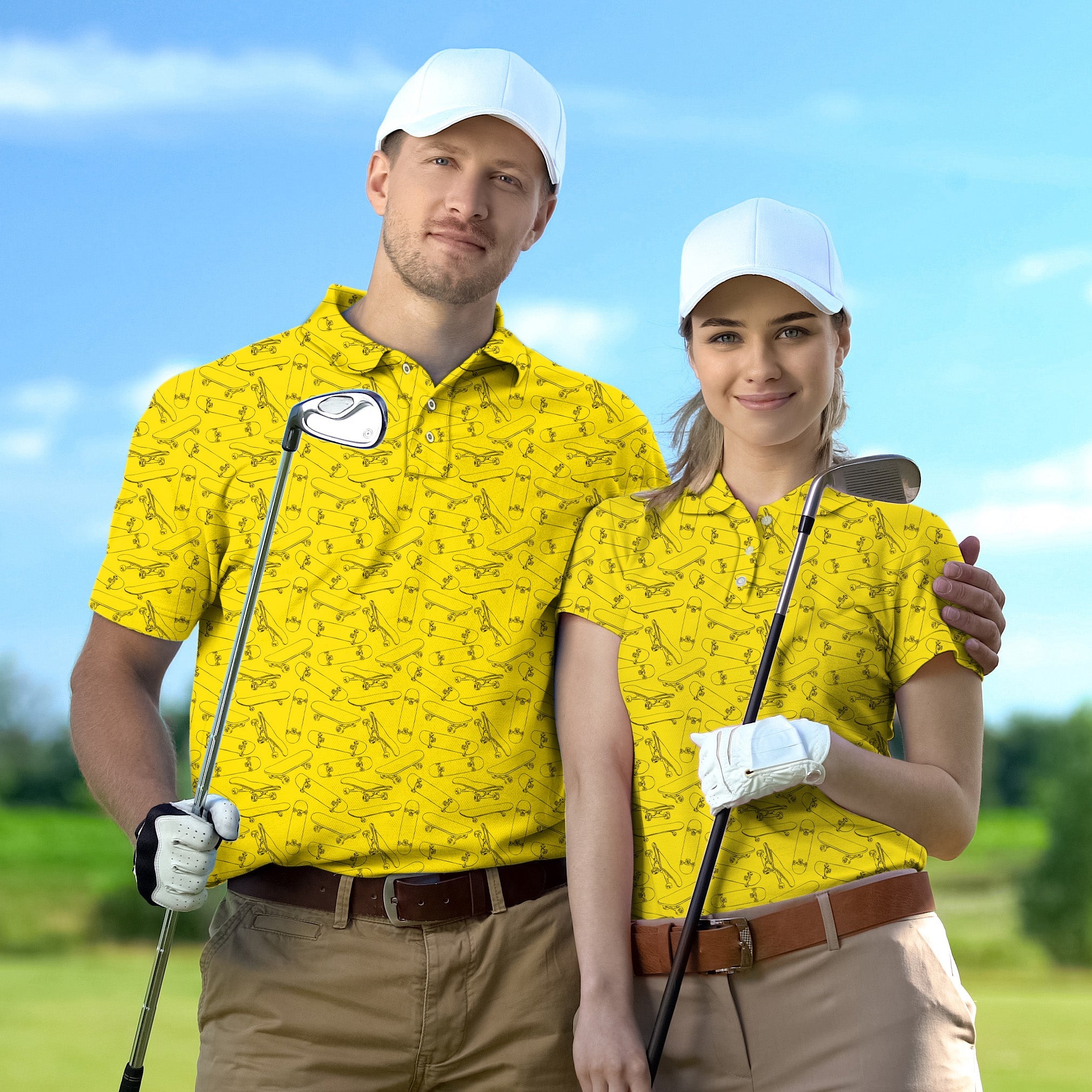 Couple wearing matching yellow skateboard print golf shirts holding clubs on golf course