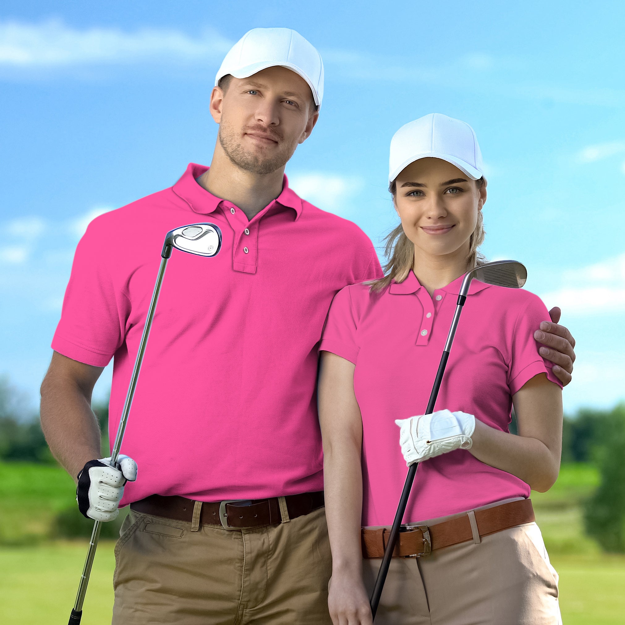 couple wearing pure fuchsia set golf polo shirts with white caps holding golf clubs on golf course