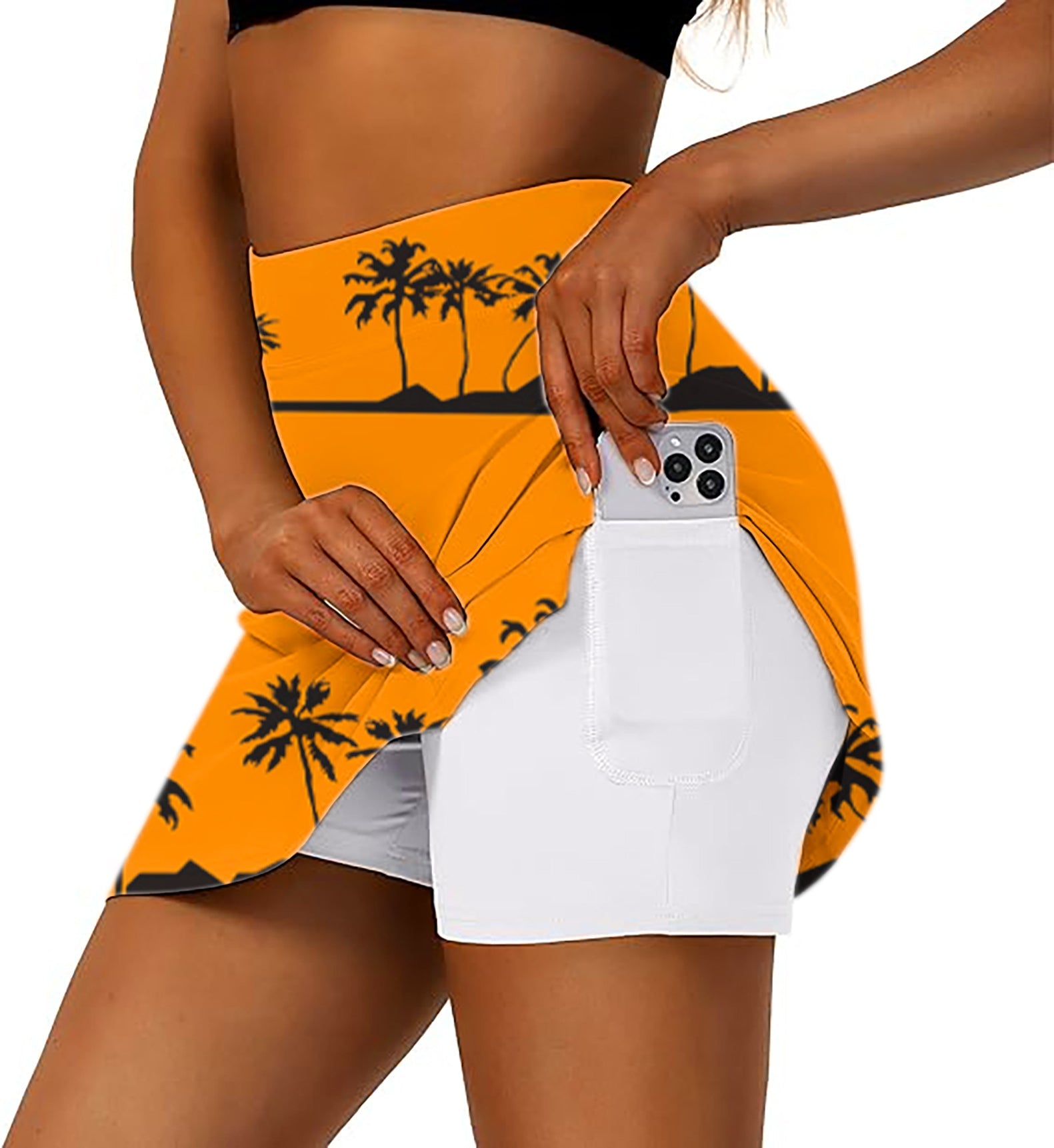 Women's Athletic Golf skorts with setting sun and coconut tree design and phone pocket