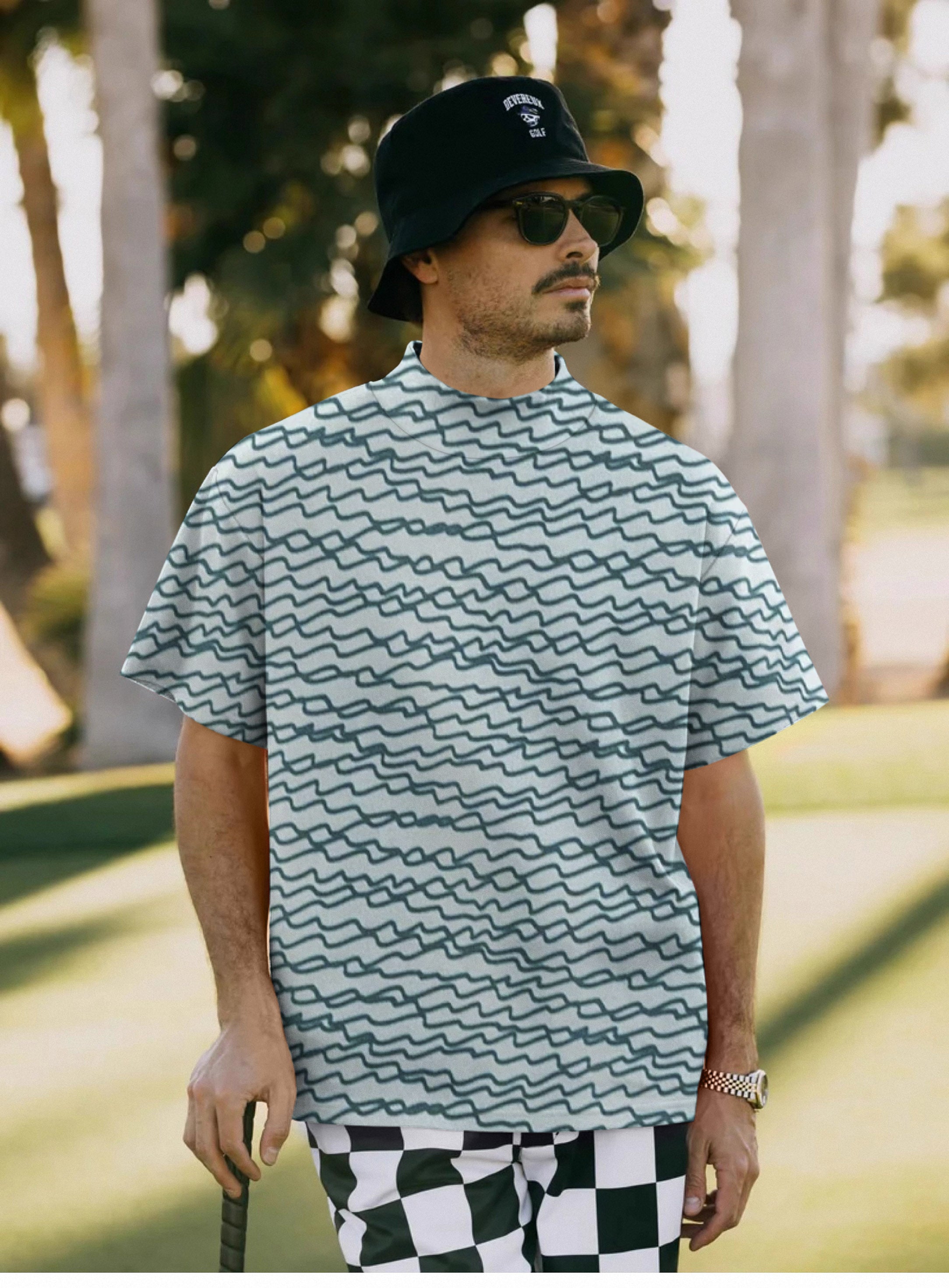 Men's green irregular wavy lines pullover high neck short sleeve t-shirt worn by man outdoors