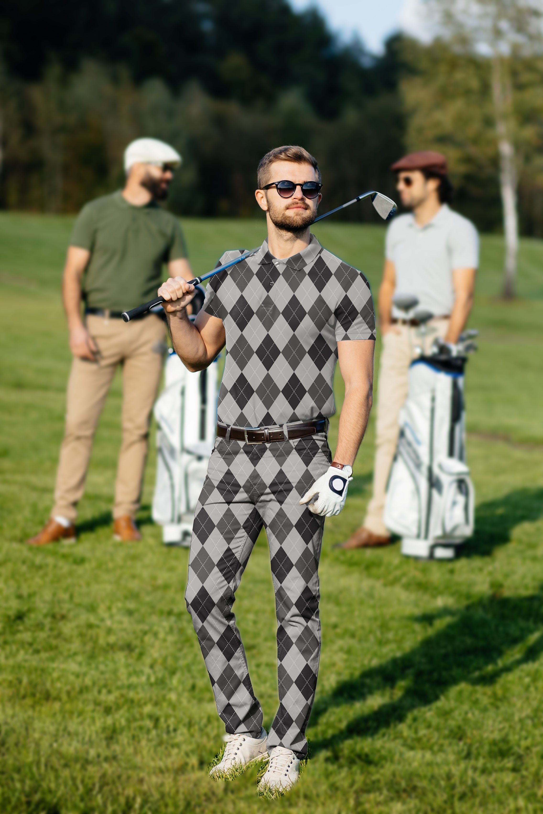 Men's golf set grey argyle polo and pants with classic fit and four-way stretch on golf course