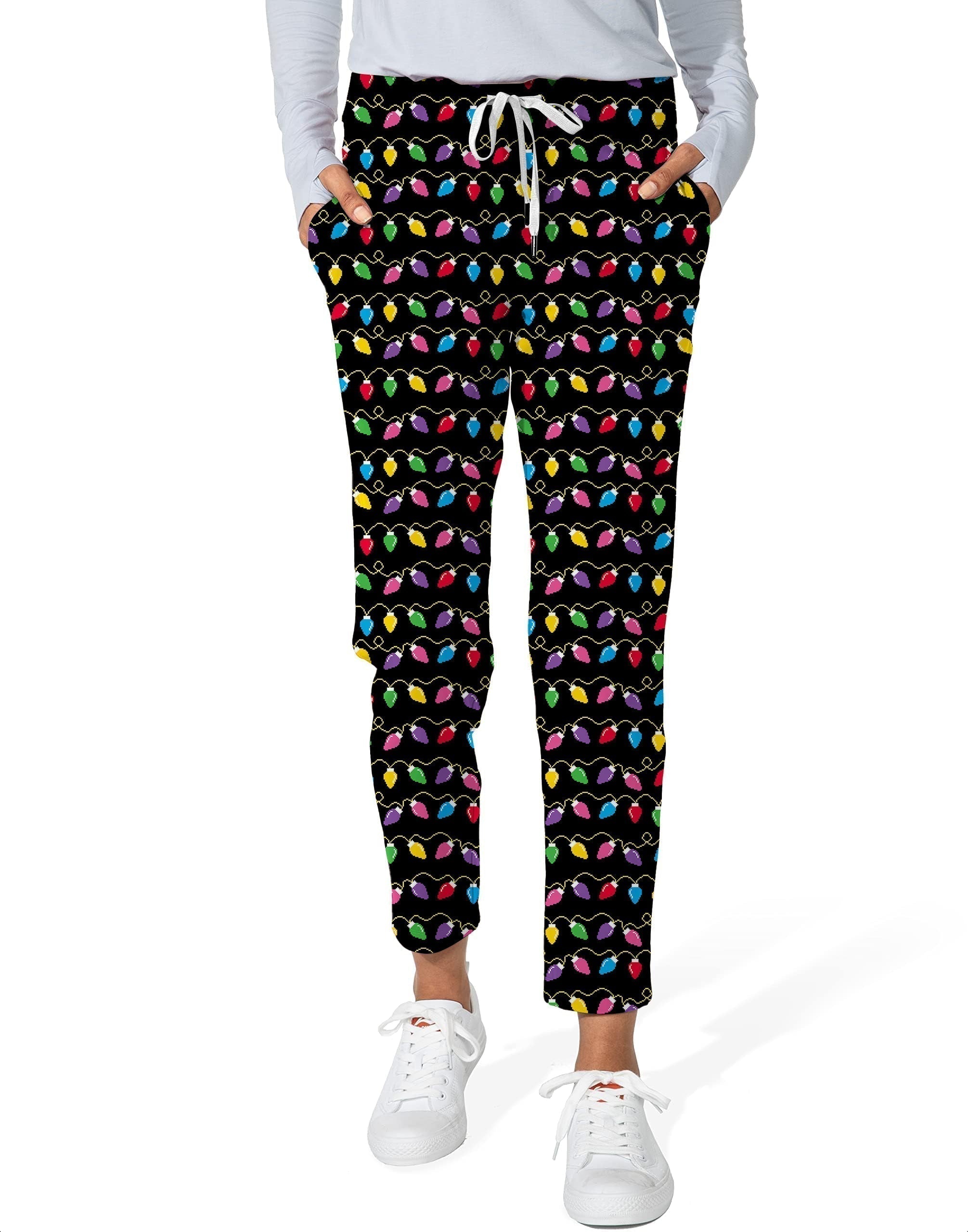 Christmas Lights Women's 7/8 stretch ankle golf pants with colorful light pattern, elastic waistband, and deep side pockets.