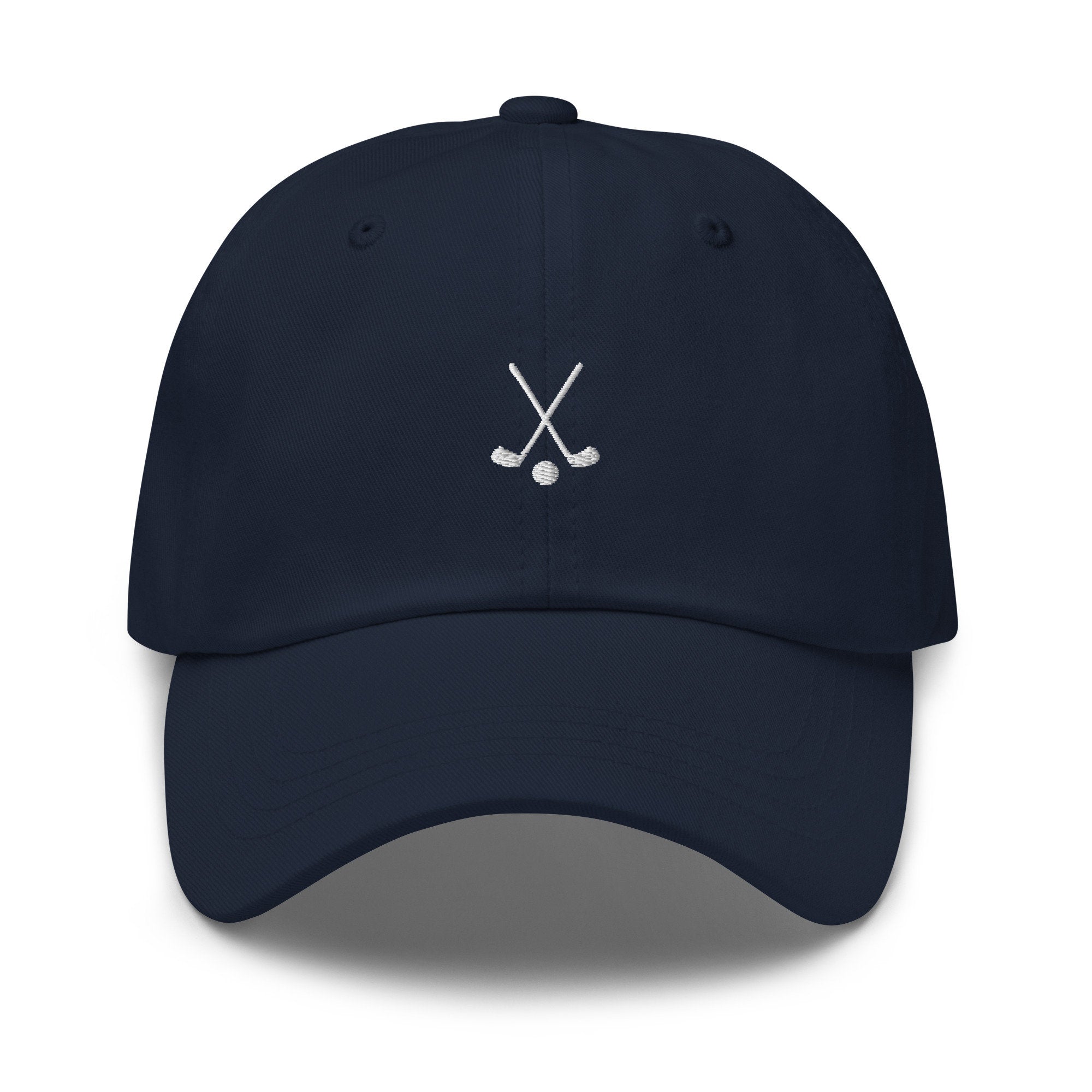 Custom embroidered navy blue golf dad hat with crossed golf clubs design and adjustable snapback.