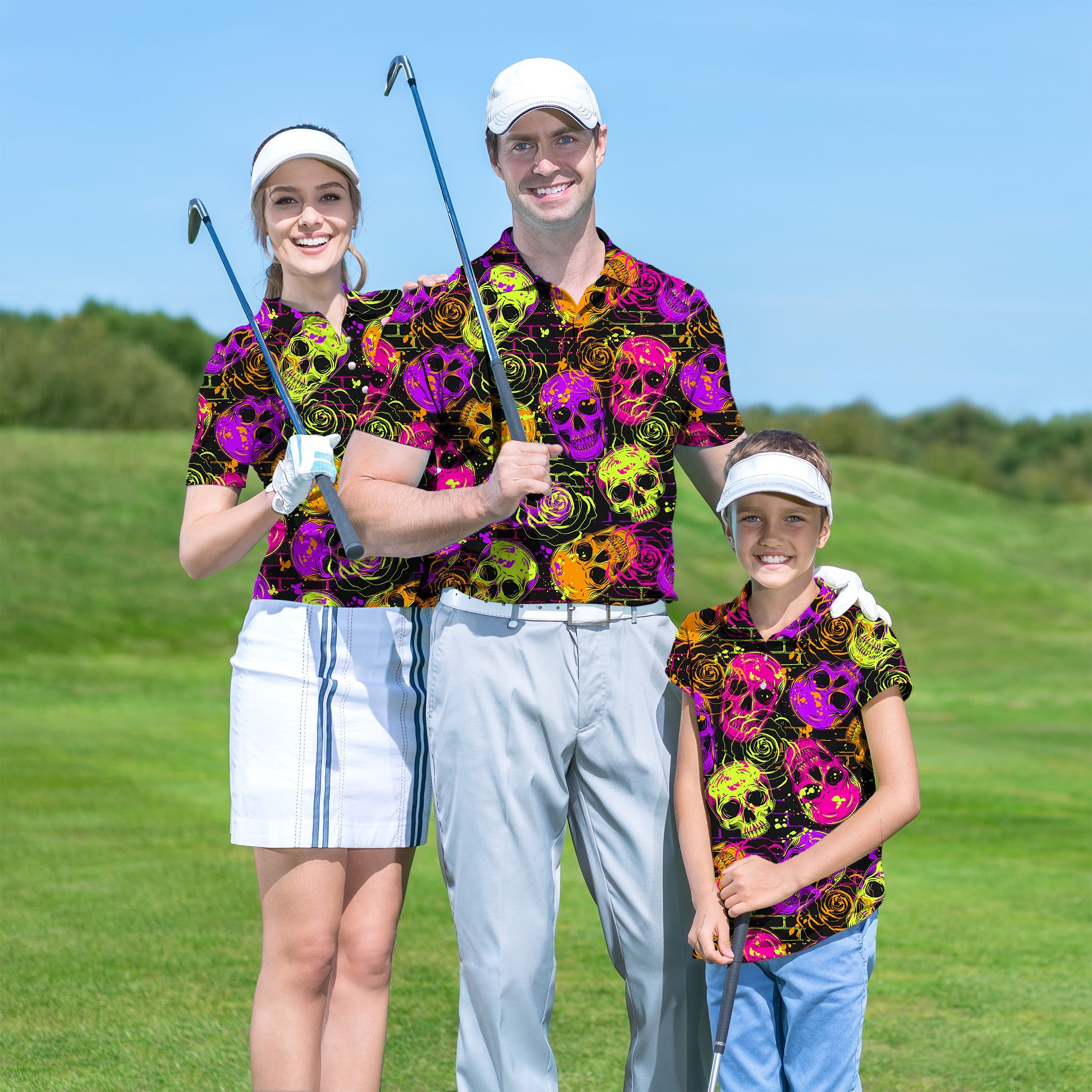 Family wearing vibrant Halloween colors skull print golf shirts on golf course
