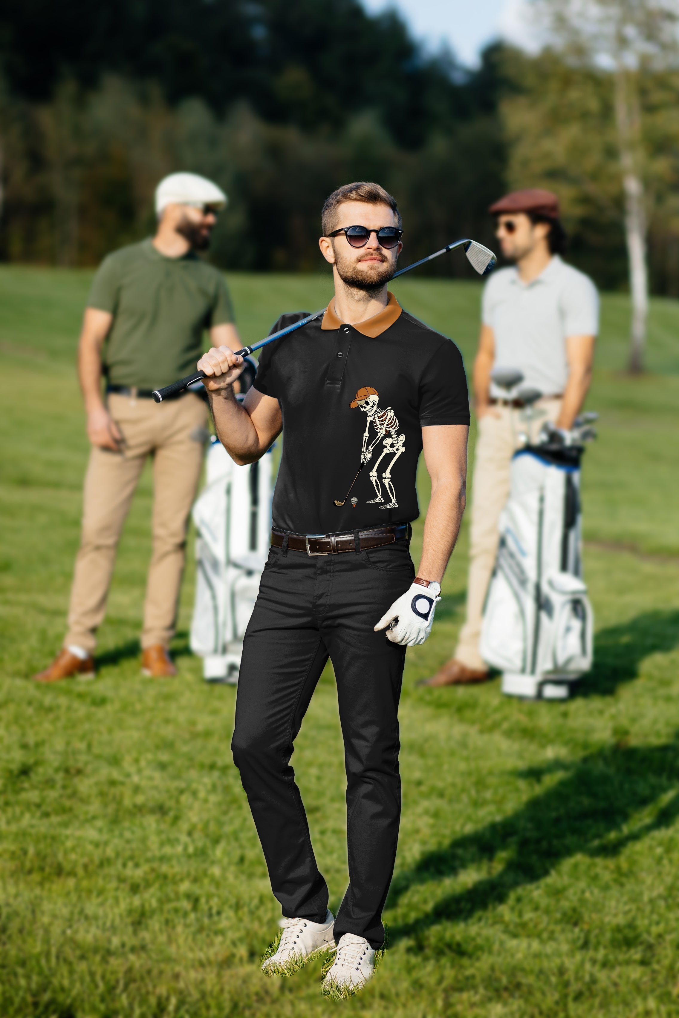 Men's golf set with pumpkin black skeleton polo and pants on golf course