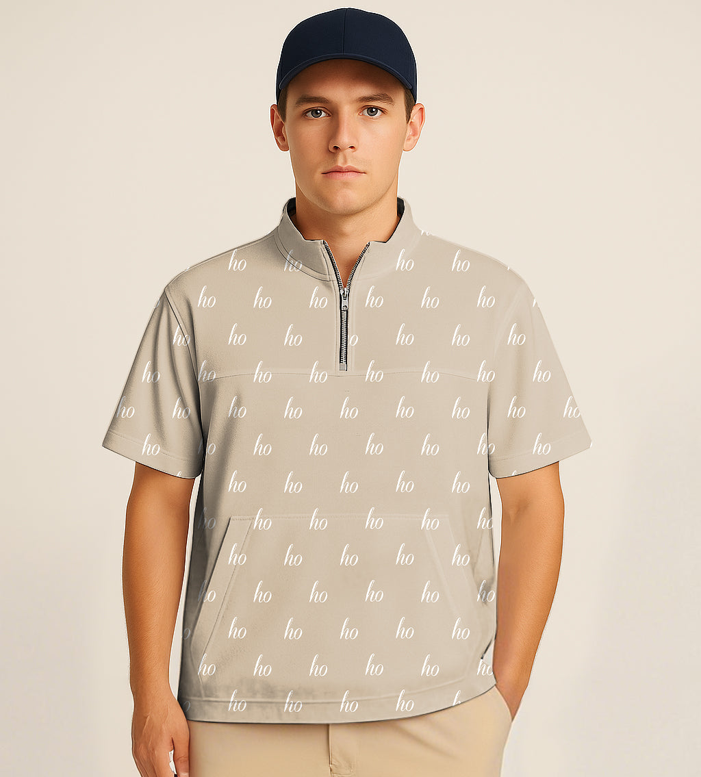 Beige half zipper turtleneck golf short shirt with custom name embroidery and short sleeves worn by male model