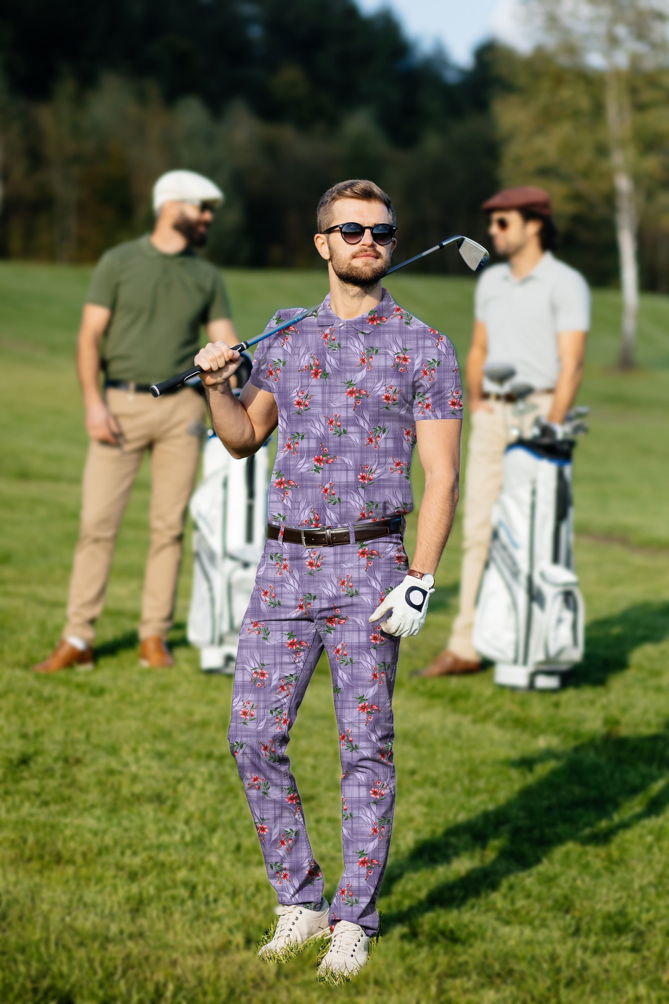 Men's golf set with purple flower polo and pants on golf course