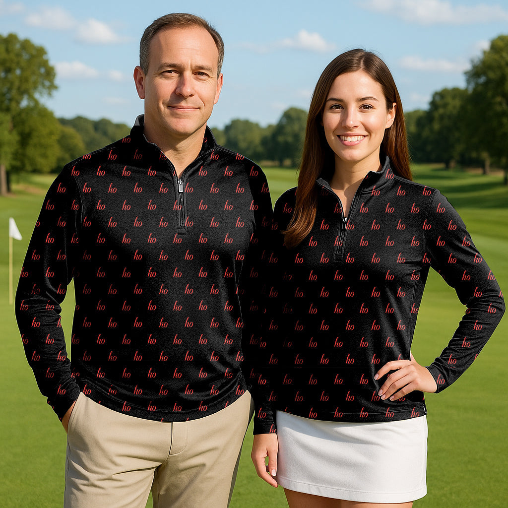 Couple wearing black custom name Christmas golf active 3/4 zip tops with long sleeves on golf course