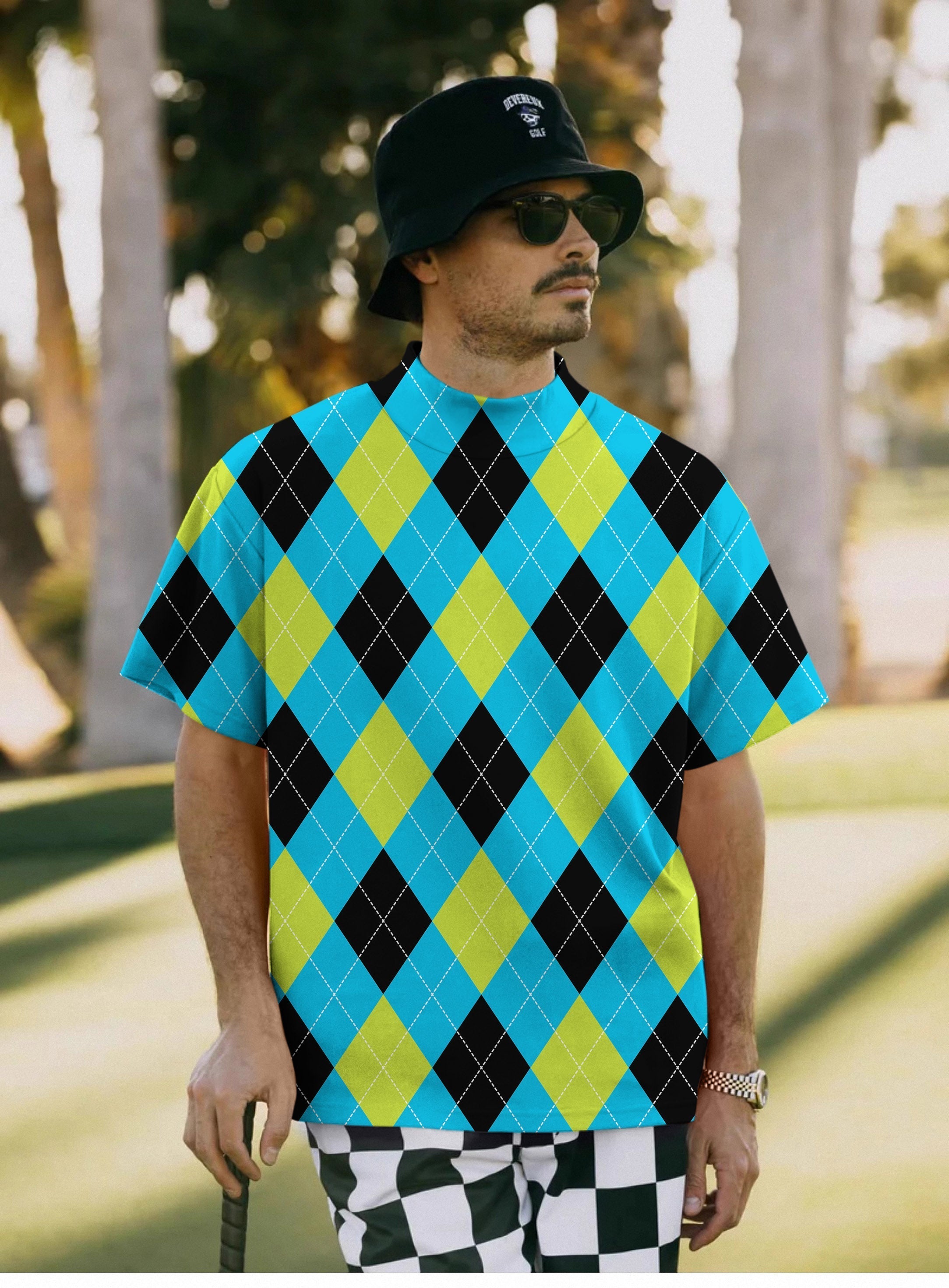 Men's Halloween argyle pullover t-shirt in black, green, blue, and white with short sleeves and high neck