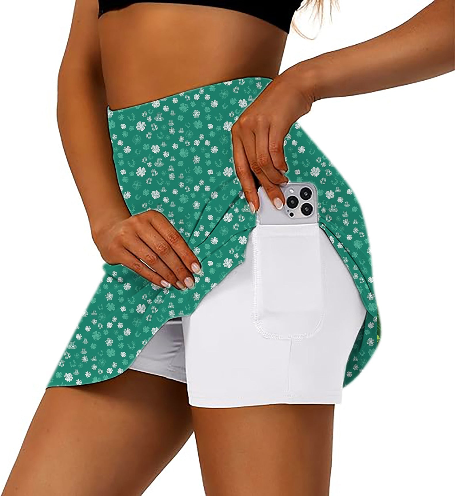 Women's athletic golf skort with green beer clover leaf St. Patrick's Day design and phone pocket