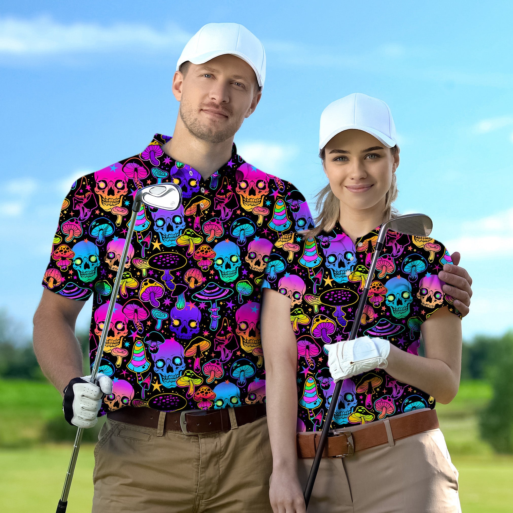 Couple wearing neon skull pattern golf shirts holding clubs on golf course