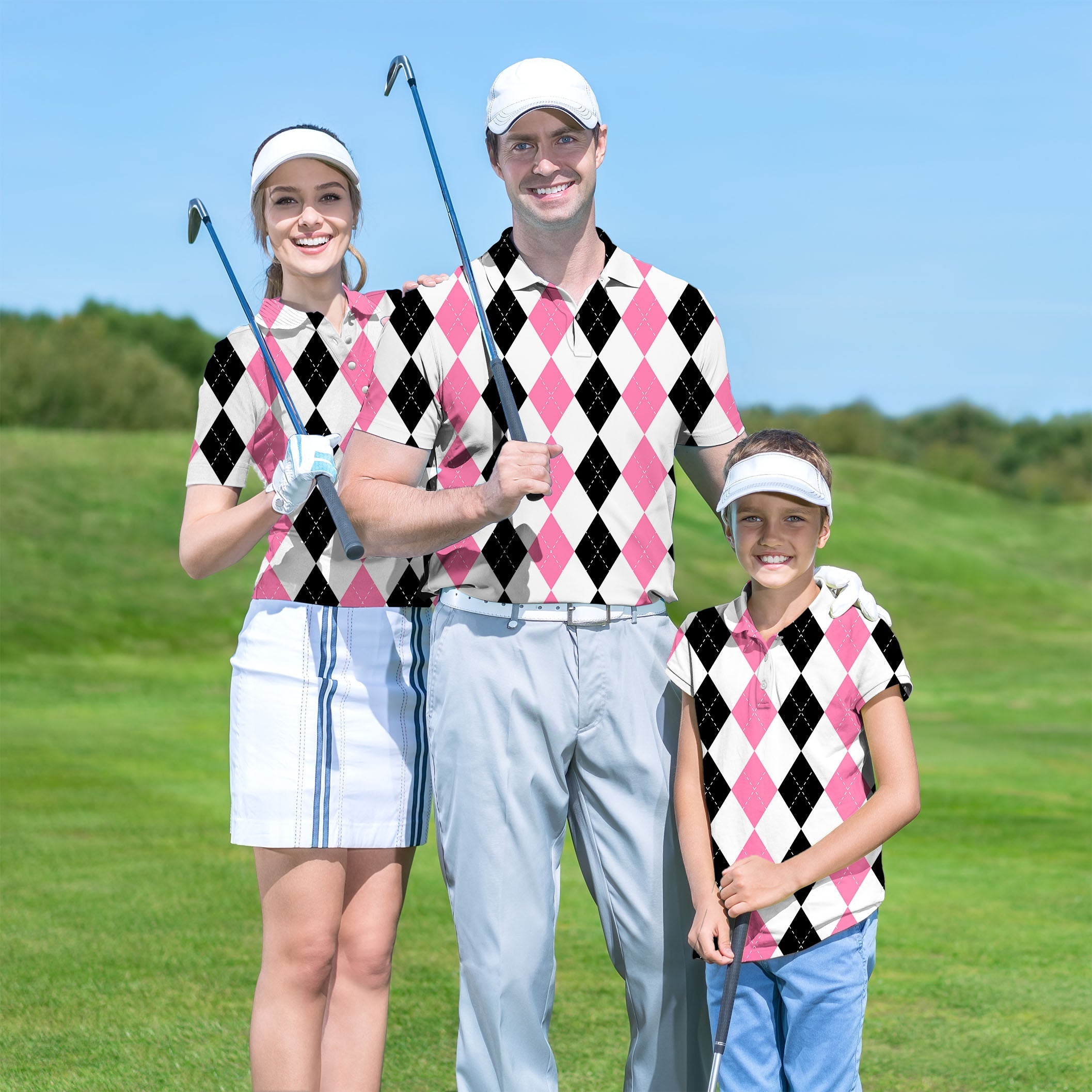 Family wearing matching pink and black argyle golf shirts on the golf course