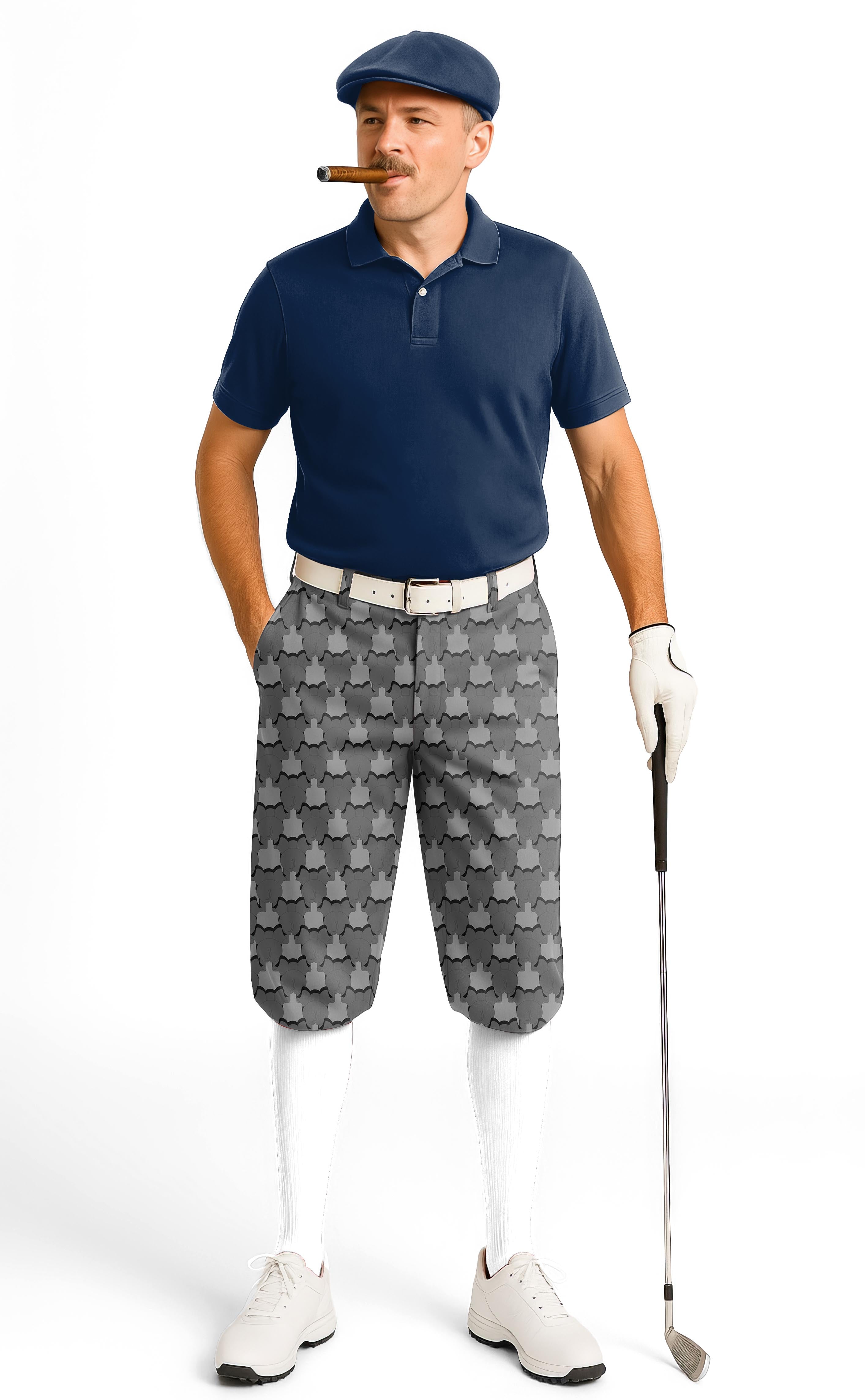 Man wearing The back of an elephant men's golf knickers with ankle cuffs and patterned fabric holding a golf club