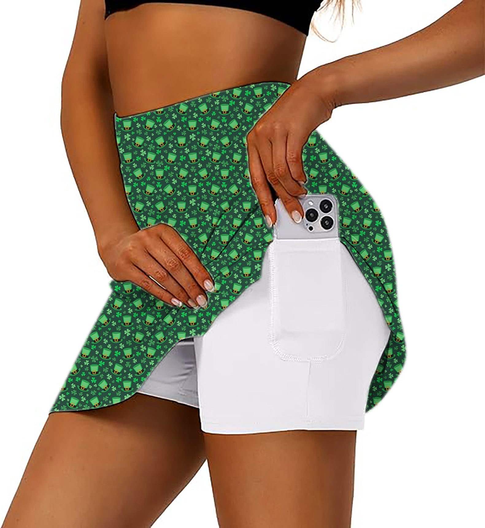Women’s St. Patrick’s Day athletic golf skorts with leprechaun hat and clover leaf pattern and side phone pocket