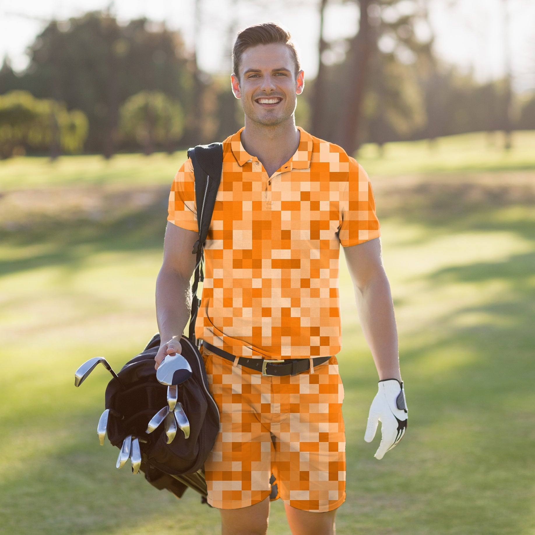 Men's golf set with orange pixel polo and shorts, moisture-wicking, UV protection, wrinkle-resistant, and four-way stretch fabric.