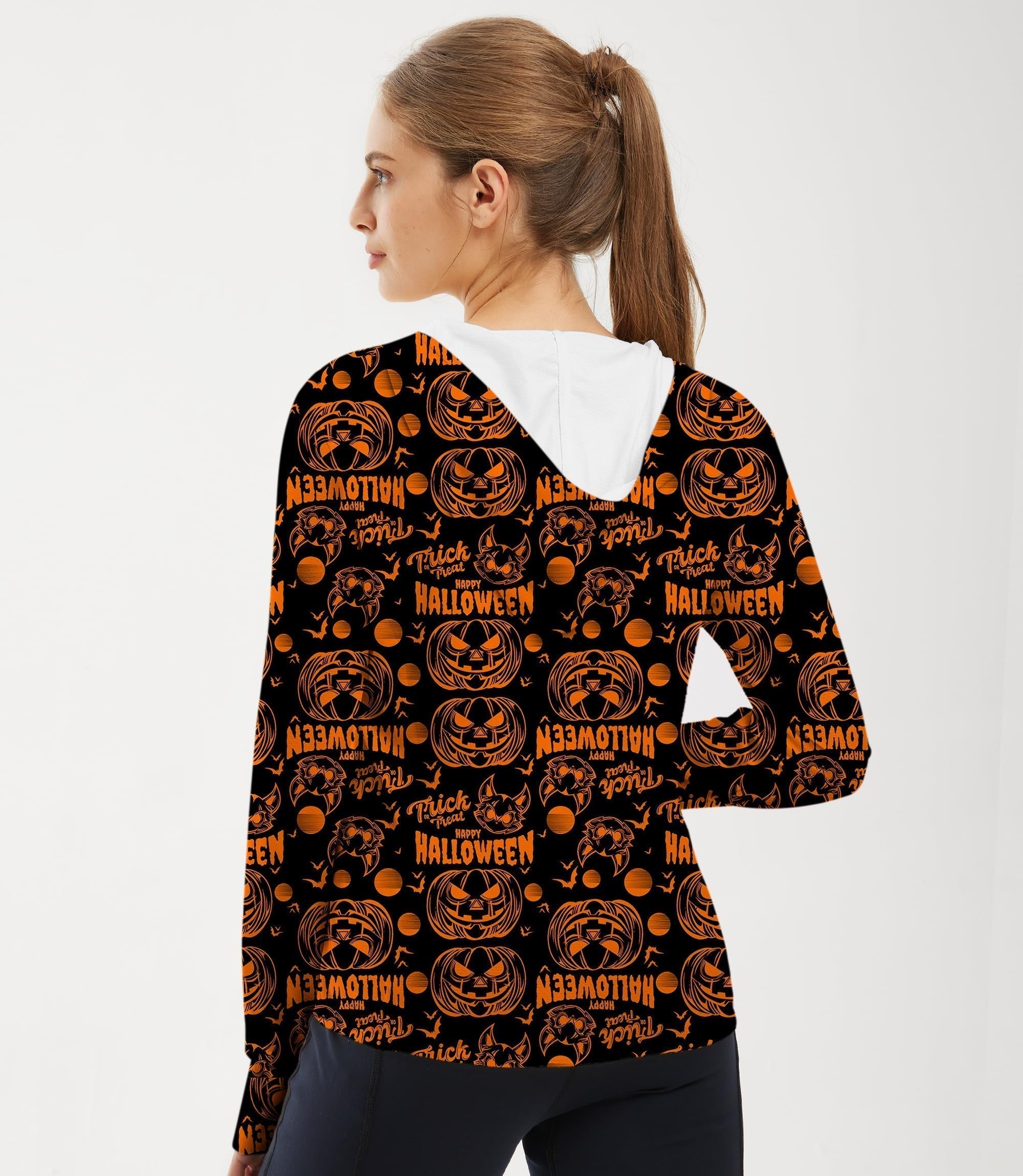 Women's slim fit zip hoodie with orange Halloween pumpkin print, sun protection, and lightweight breathable fabric for outdoor golf and activities