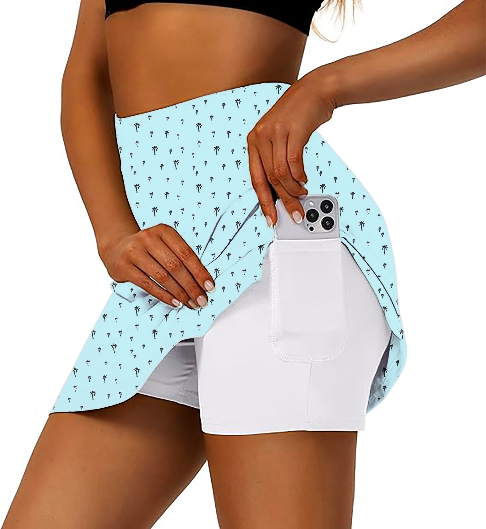 Women's light blue palm print golf skirt with inner shorts and phone pocket
