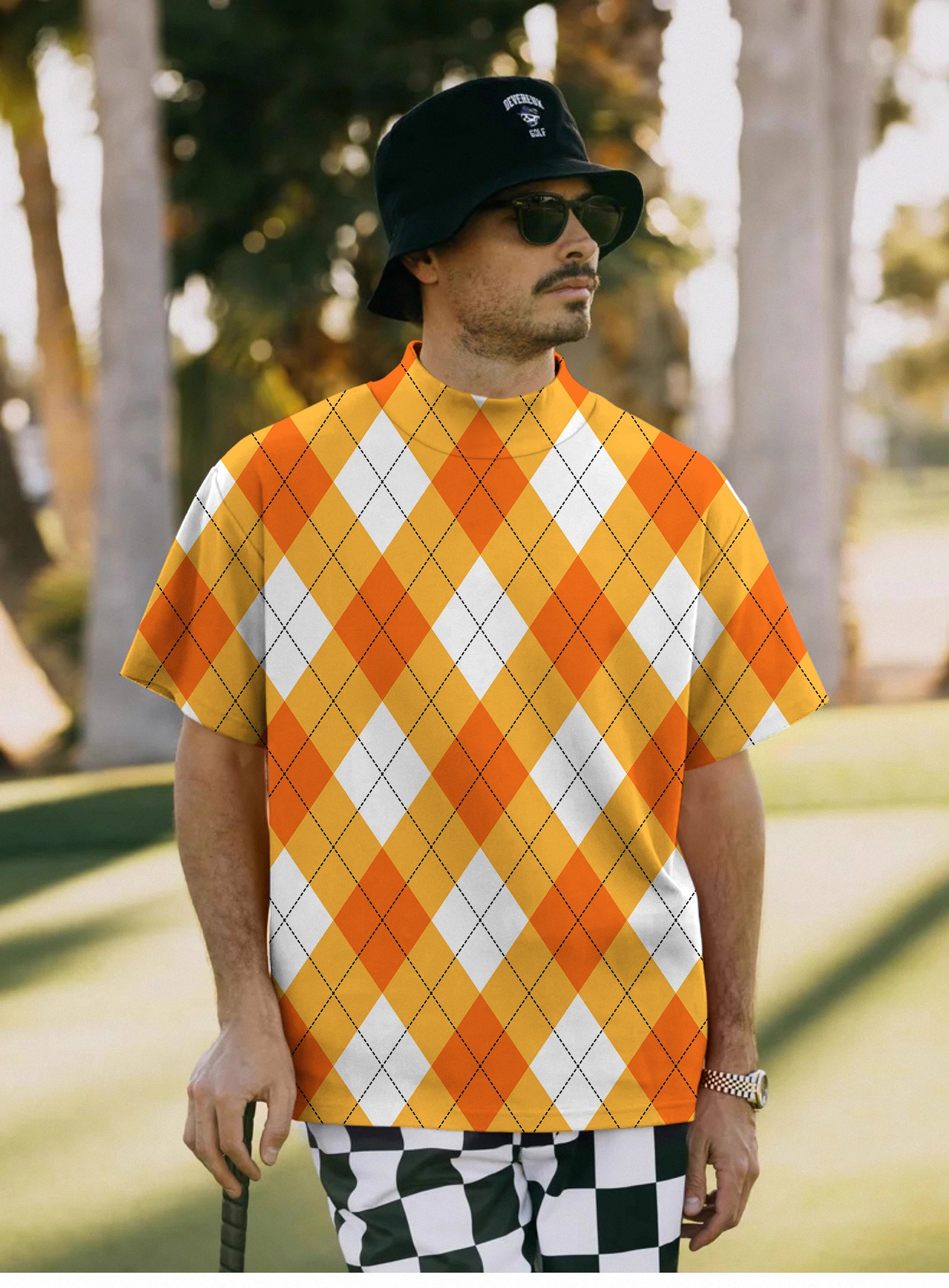 Men's Halloween Cross orange white argyle pullover with high neck and short sleeves worn outdoors