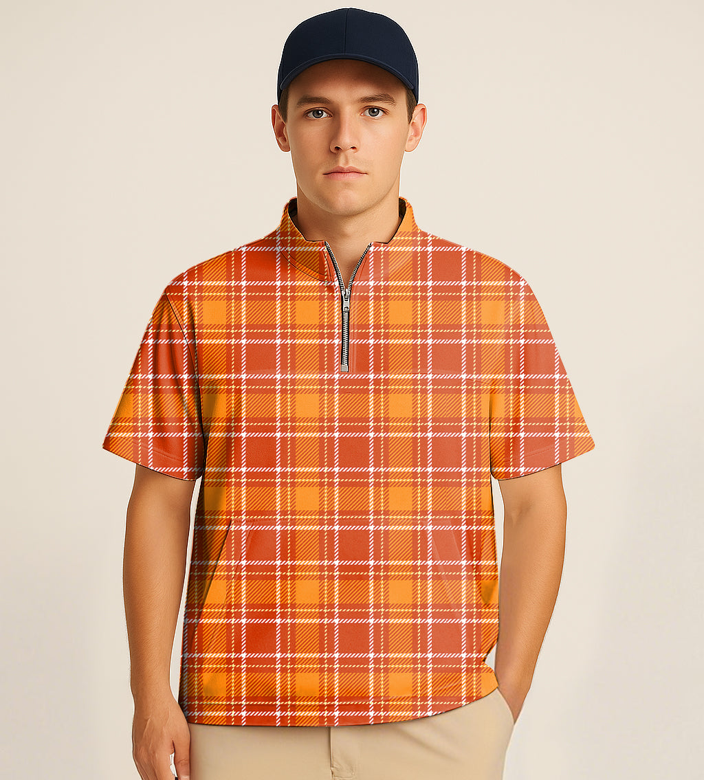 Man wearing orange grid half zipper turtleneck golf short shirt with embroidery and navy cap
