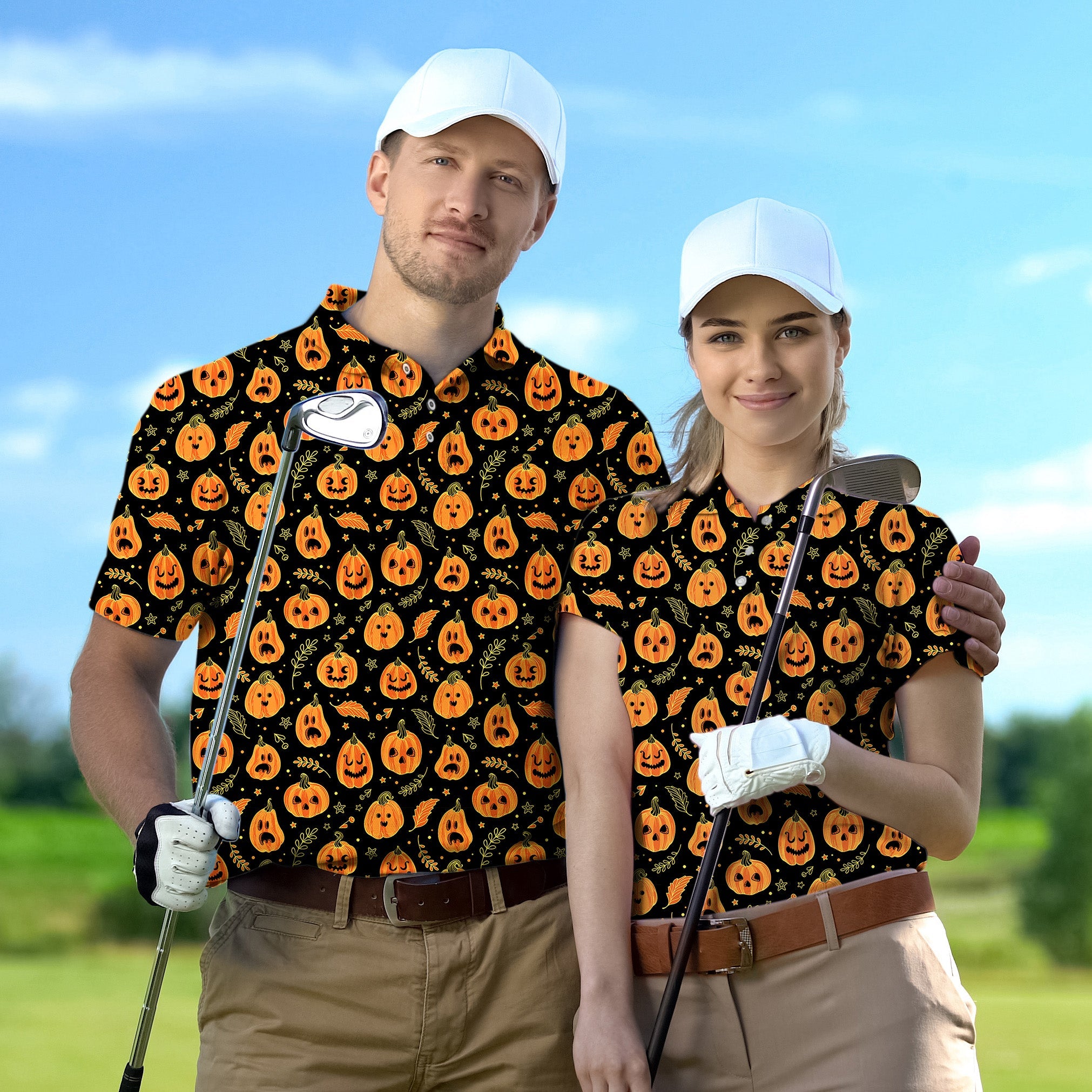 Couple wearing Halloween-themed pumpkin and bones golf shirts with white caps on golf course
