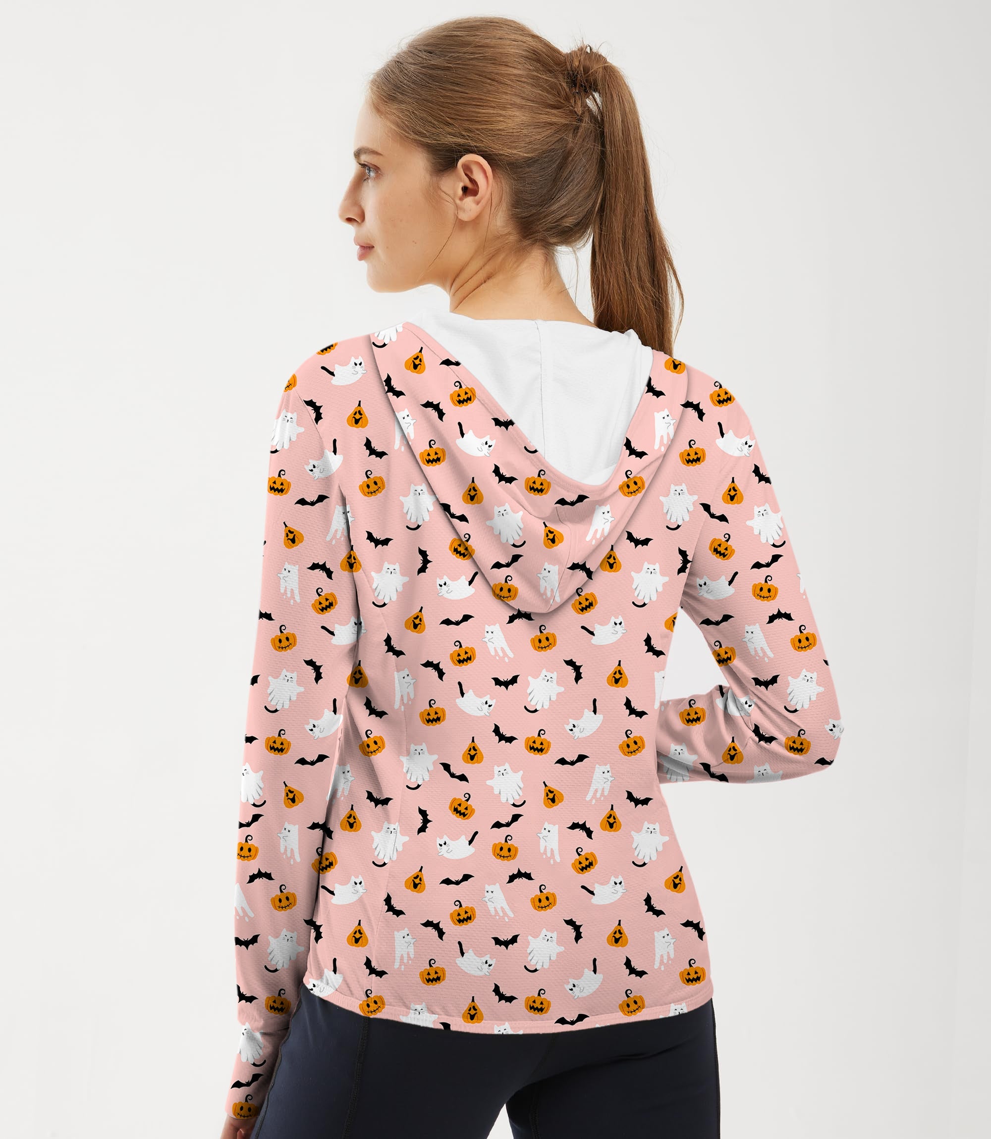 Women's pink Halloween hoodie with kawaii ghost and pumpkin print for outdoor activities