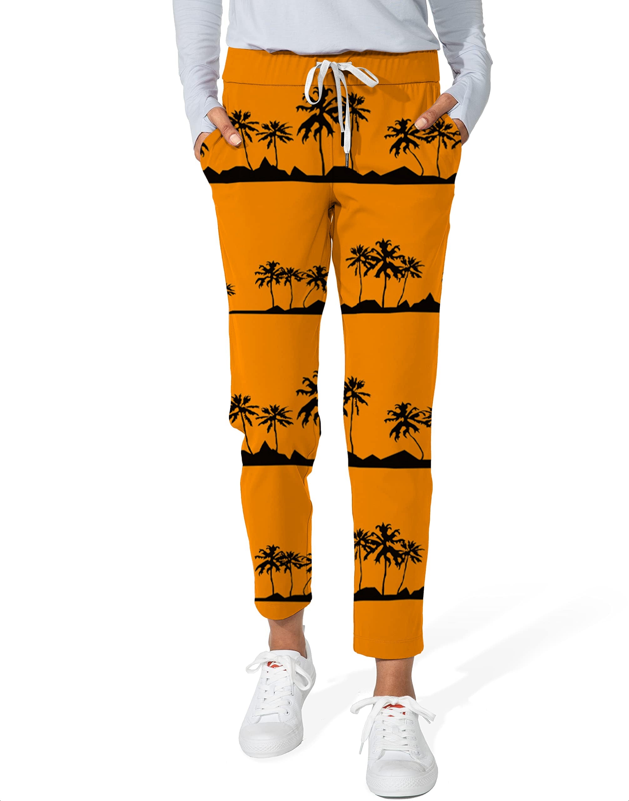 Women's 7/8 stretch ankle golf pants with setting sun and coconut trees design