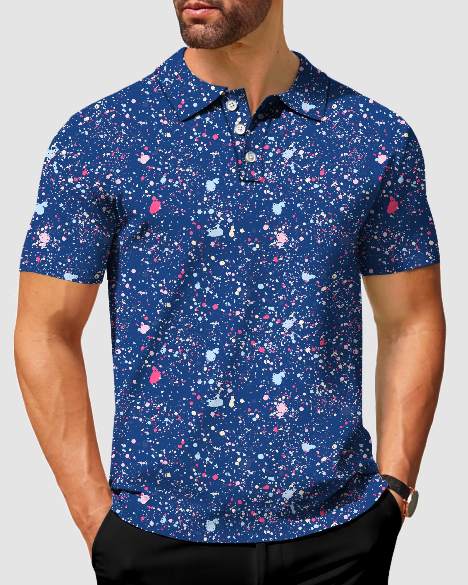 Men's navy blue ink dots polo shirt with short sleeves and classic fit on a male model