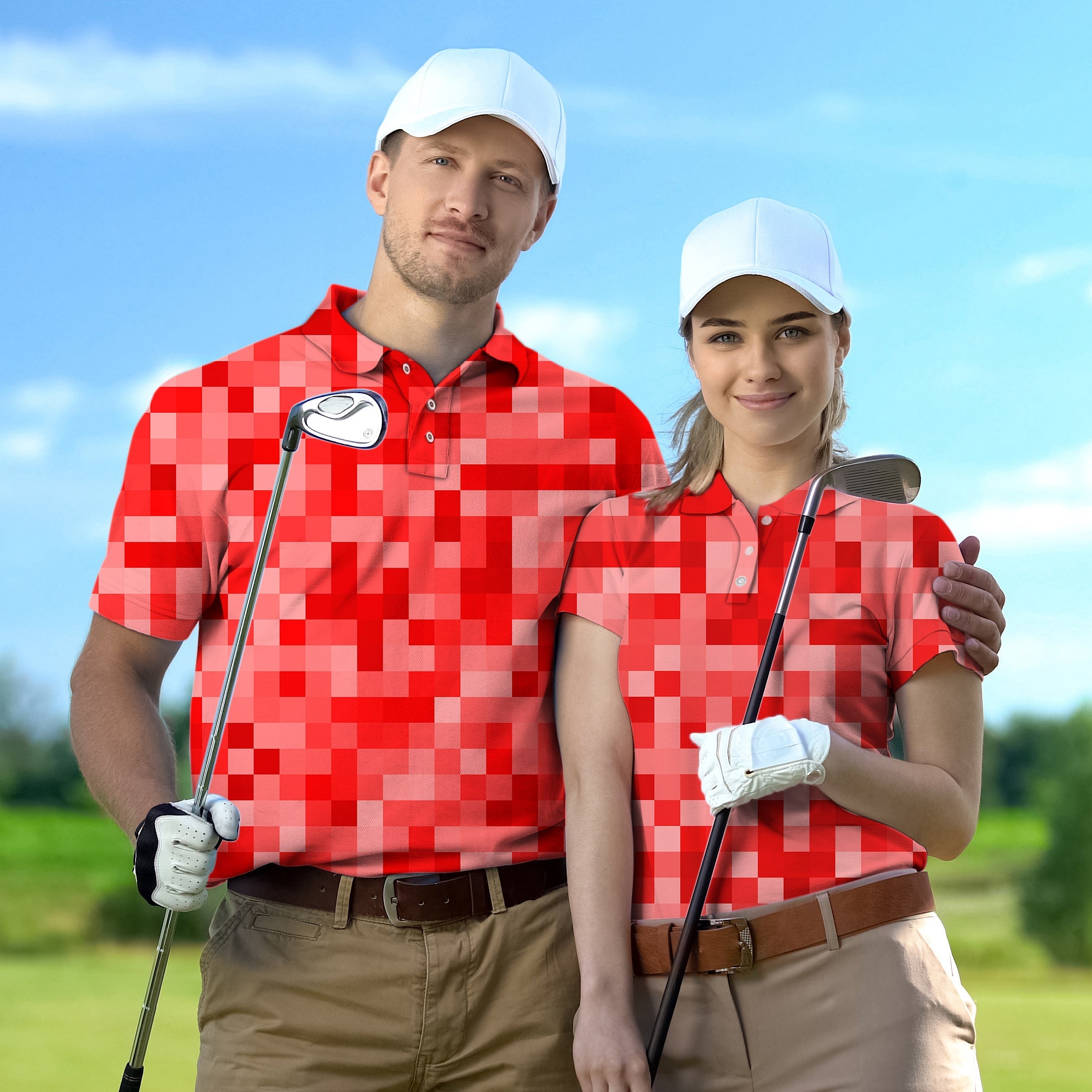 Couple wearing red pixel pattern golf shirts holding clubs on golf course