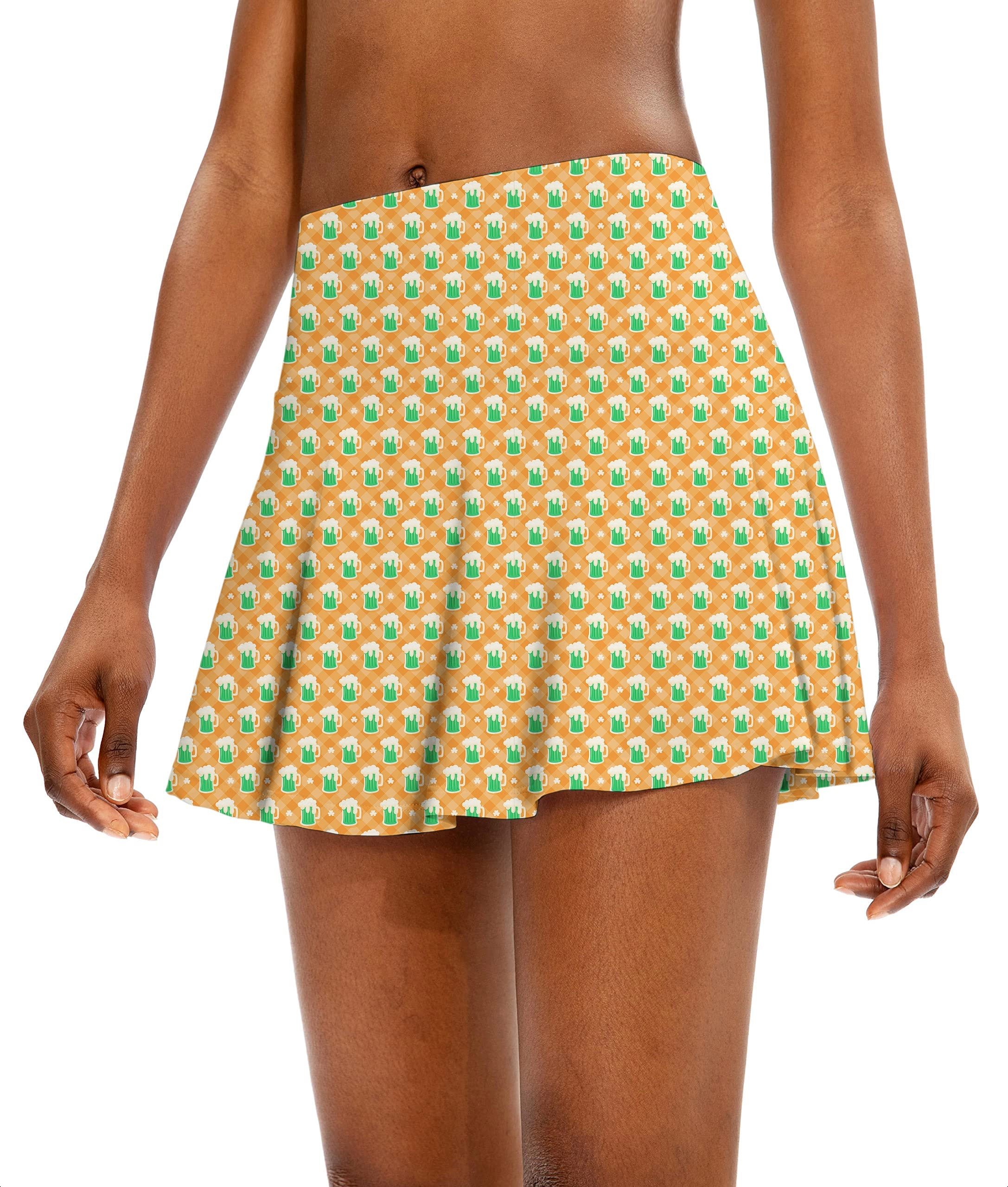Women's athletic golf skort with green beer and clover leaf pattern for St. Patrick's Day