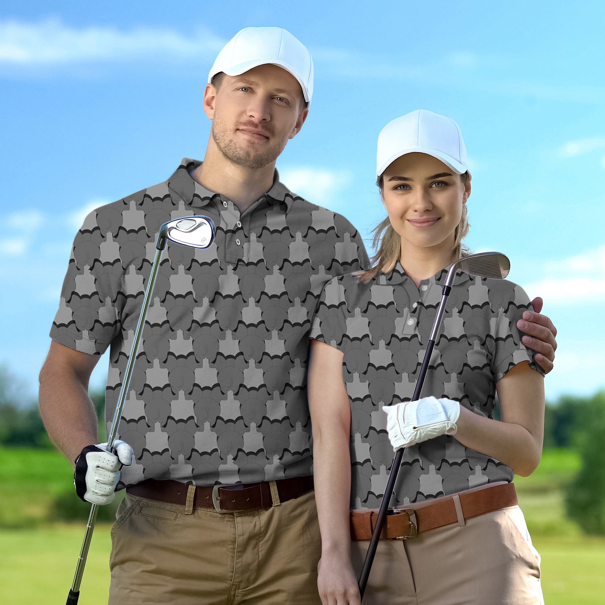 Couple wearing custom elephant pattern golf shirts holding clubs on golf course for Golf Championship Trophy tournament