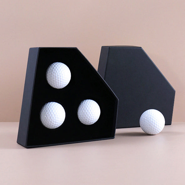 Personalized golf ball gift box with three white golf balls in stylish black packaging