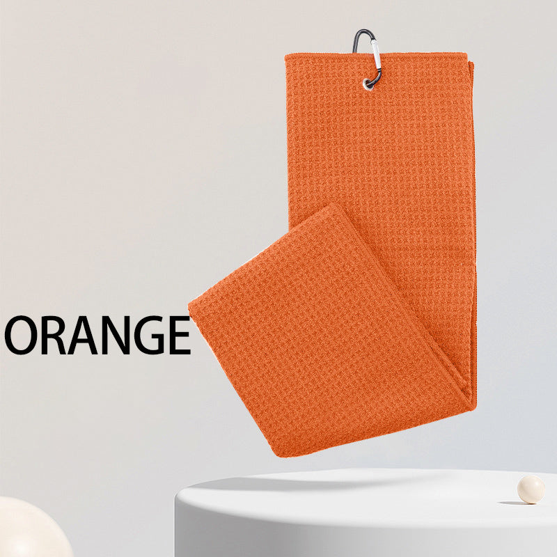 Orange sports microfiber waffle golf towel with custom embroidered logo and clip for easy attachment