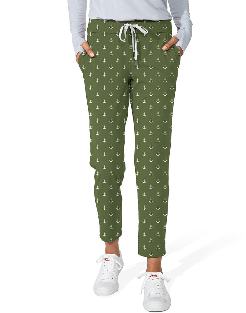 Olive green women's 7/8 stretch ankle golf pants with anchor print, elastic waistband, drawstring, and side pockets