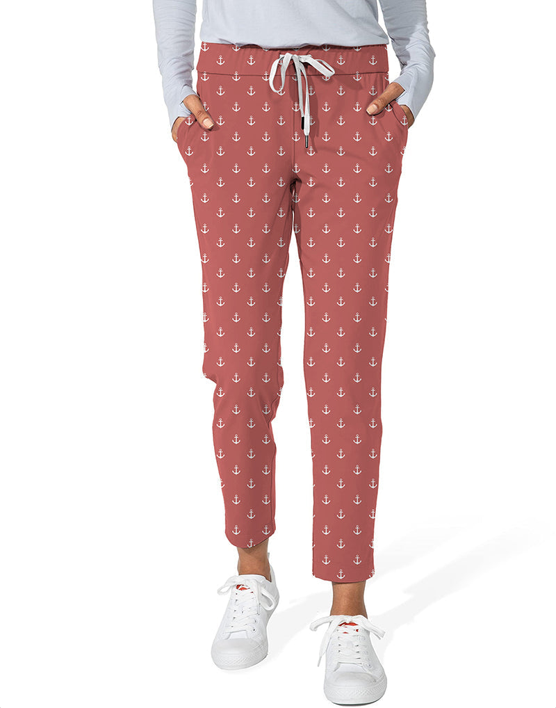 Pink red anchor patterned women's 7/8 stretch ankle golf pants with elastic waistband and side pockets