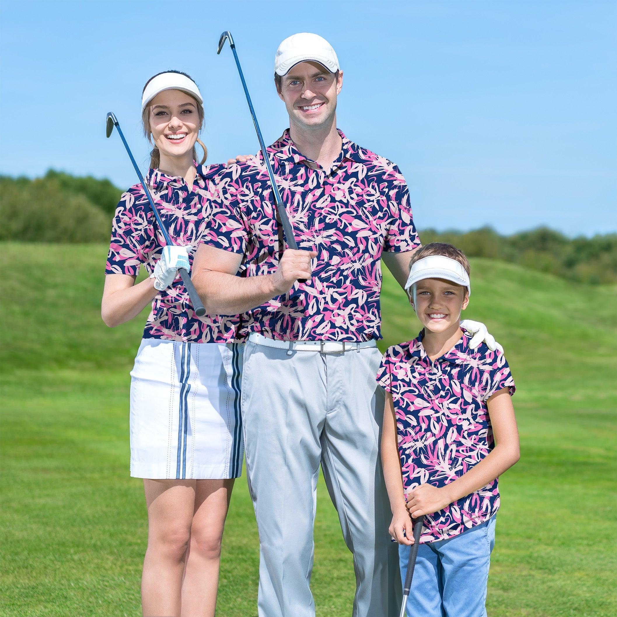 Family wearing matching Family Draw Flowers golf polo shirts on golf course with clubs