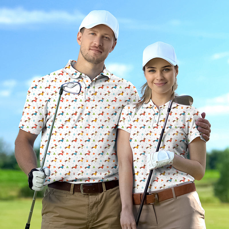 Couple wearing colorful Christmas Dachshund print golf shirts with white caps holding golf clubs on a sunny golf course