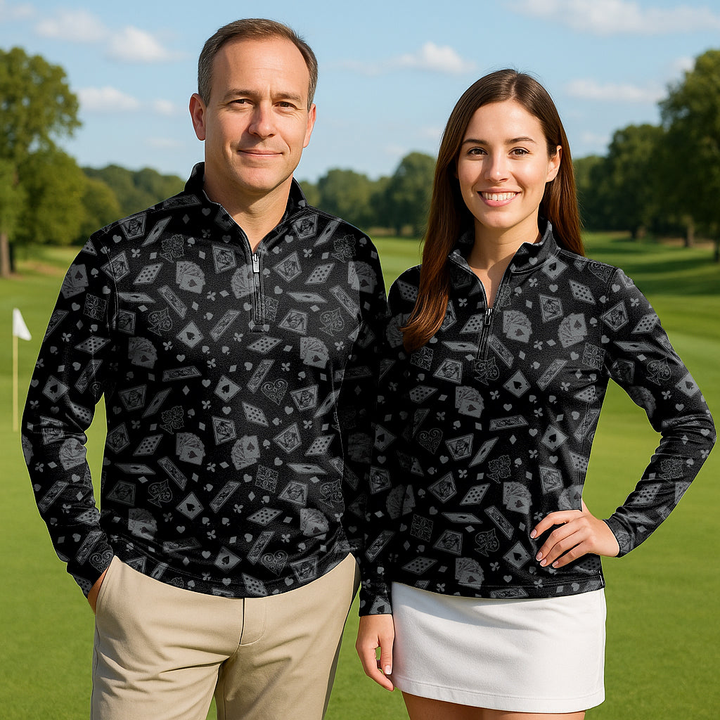 Poker Couple Golf Active 3/4 zip top long sleeves in black with poker card pattern, worn by male and female golfers outdoors
