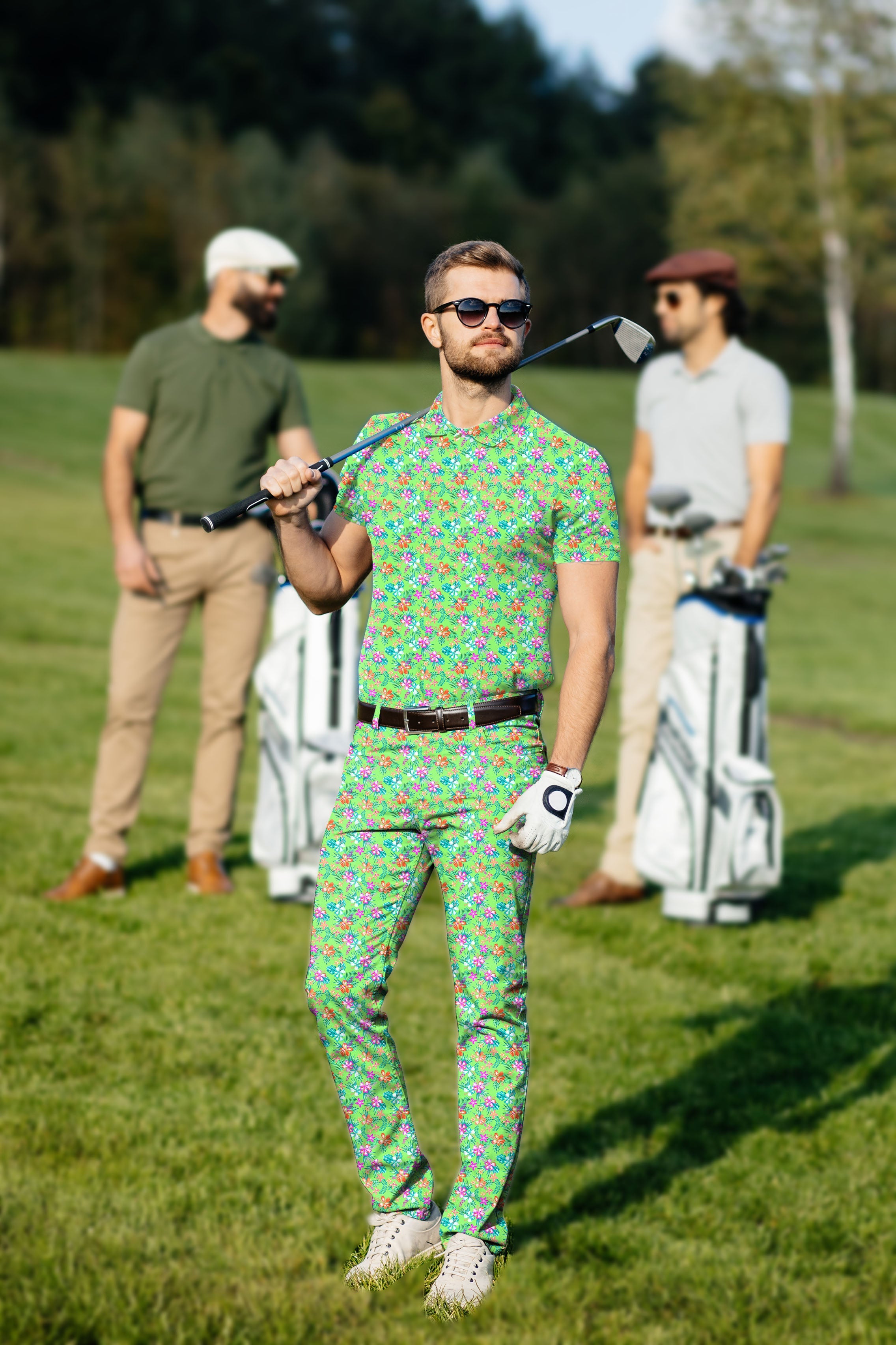 Men's Golf Set vibrant blossom polo and pants on golfer with golf club on green field
