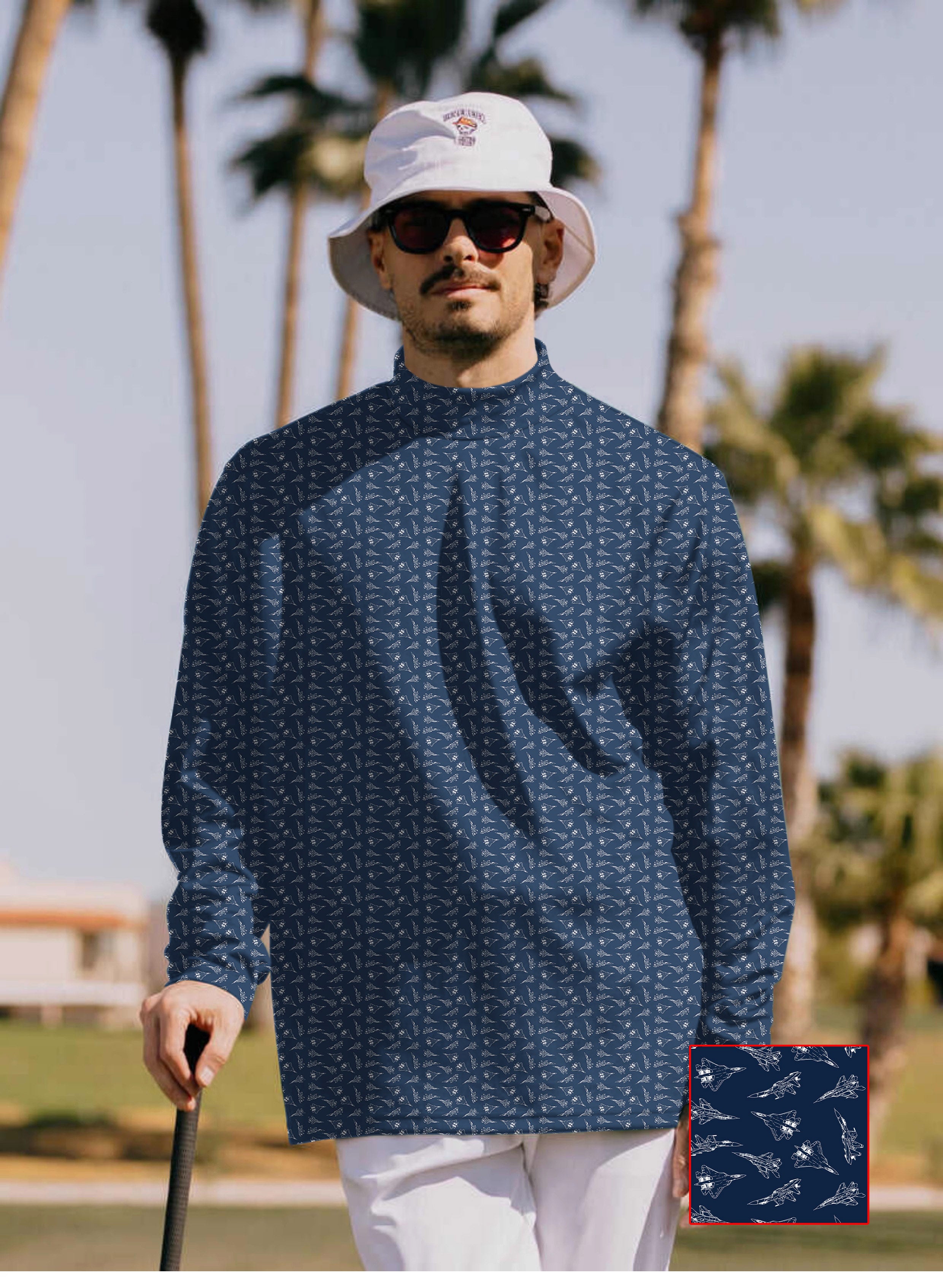 Men's Fighter Pullover high neck long sleeve shirt with navy pattern and white bucket hat outdoors