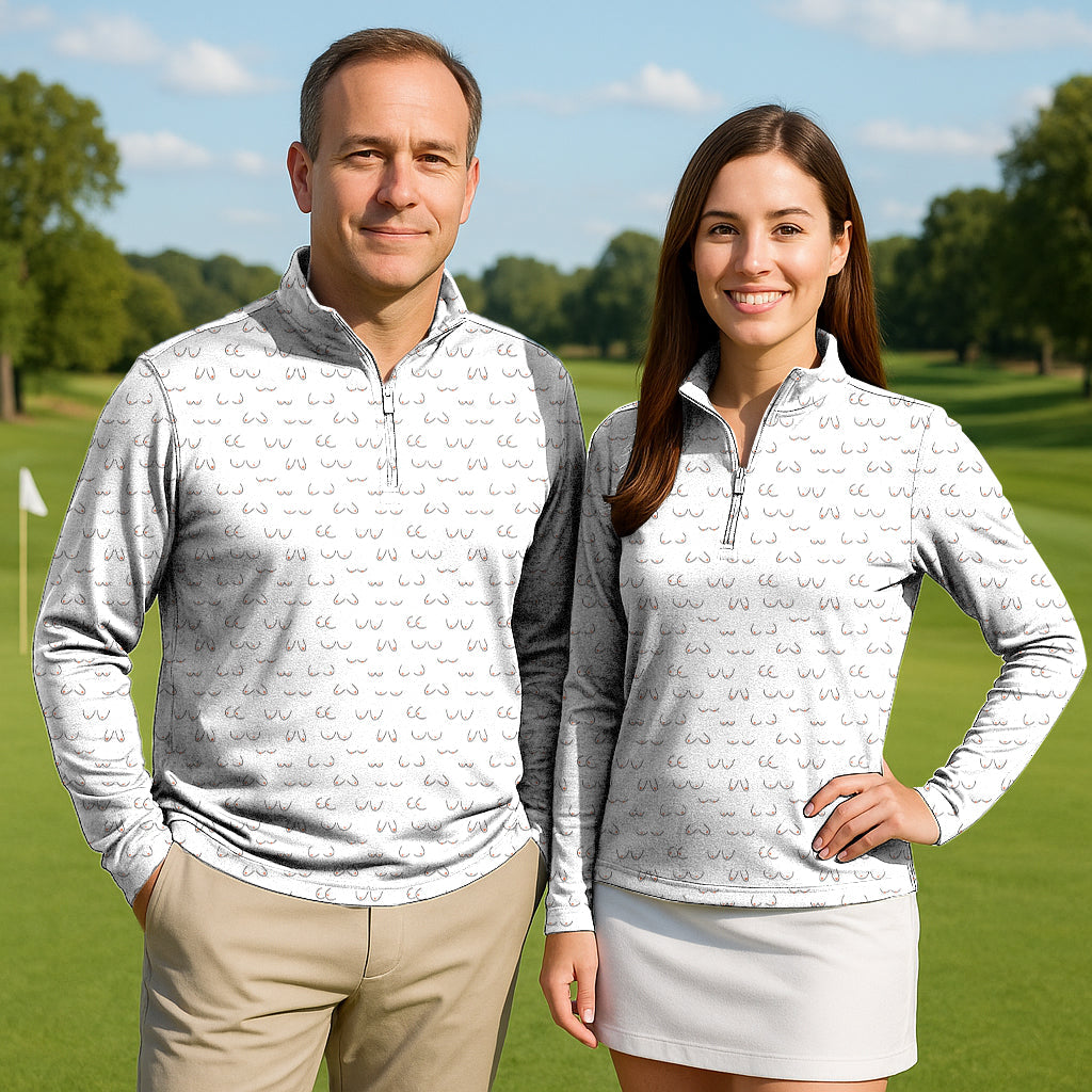 Couple wearing Sex Couple Golf Active 3/4 Zip Top long sleeve sun-safe golf shirts on a golf course
