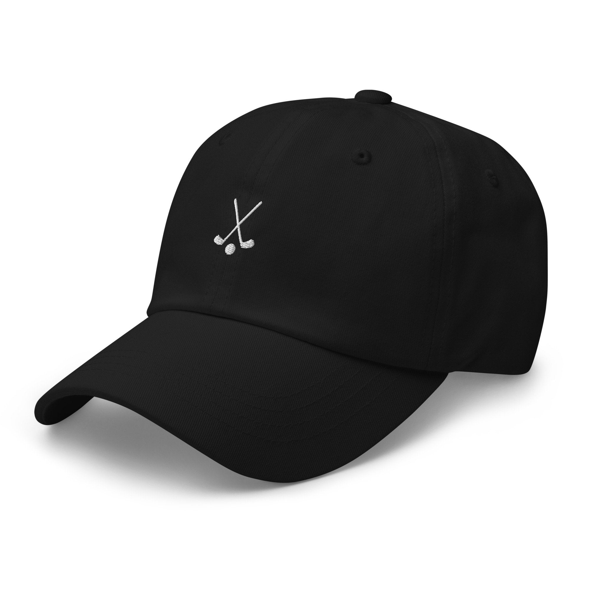 Custom embroidered black golf dad hat with crossed golf clubs design and adjustable snapback.