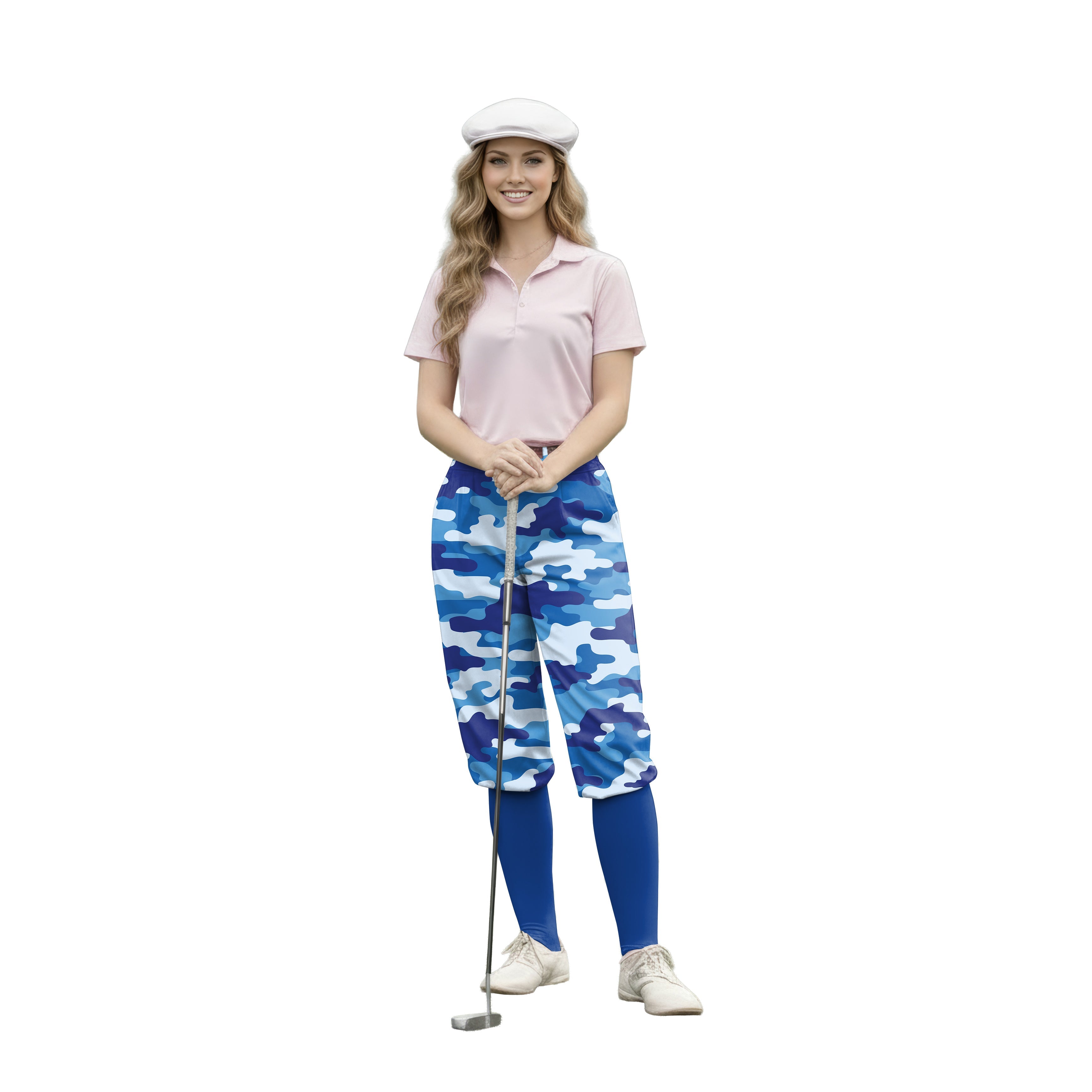 Woman wearing blue camo womens golf knickers and pink polo shirt holding golf club