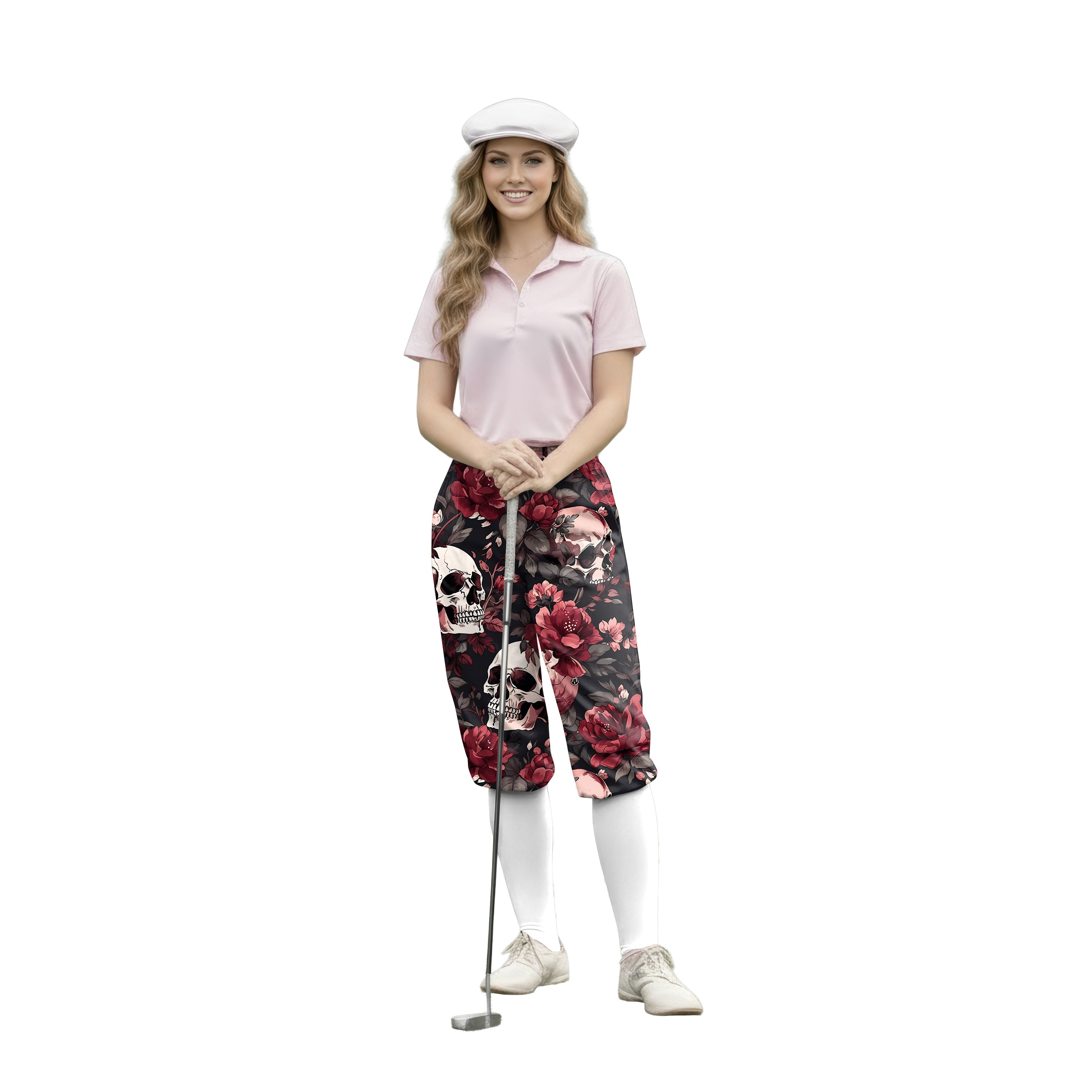Woman wearing Halloween floral skull womens golf knickers pants with pink floral and skull design